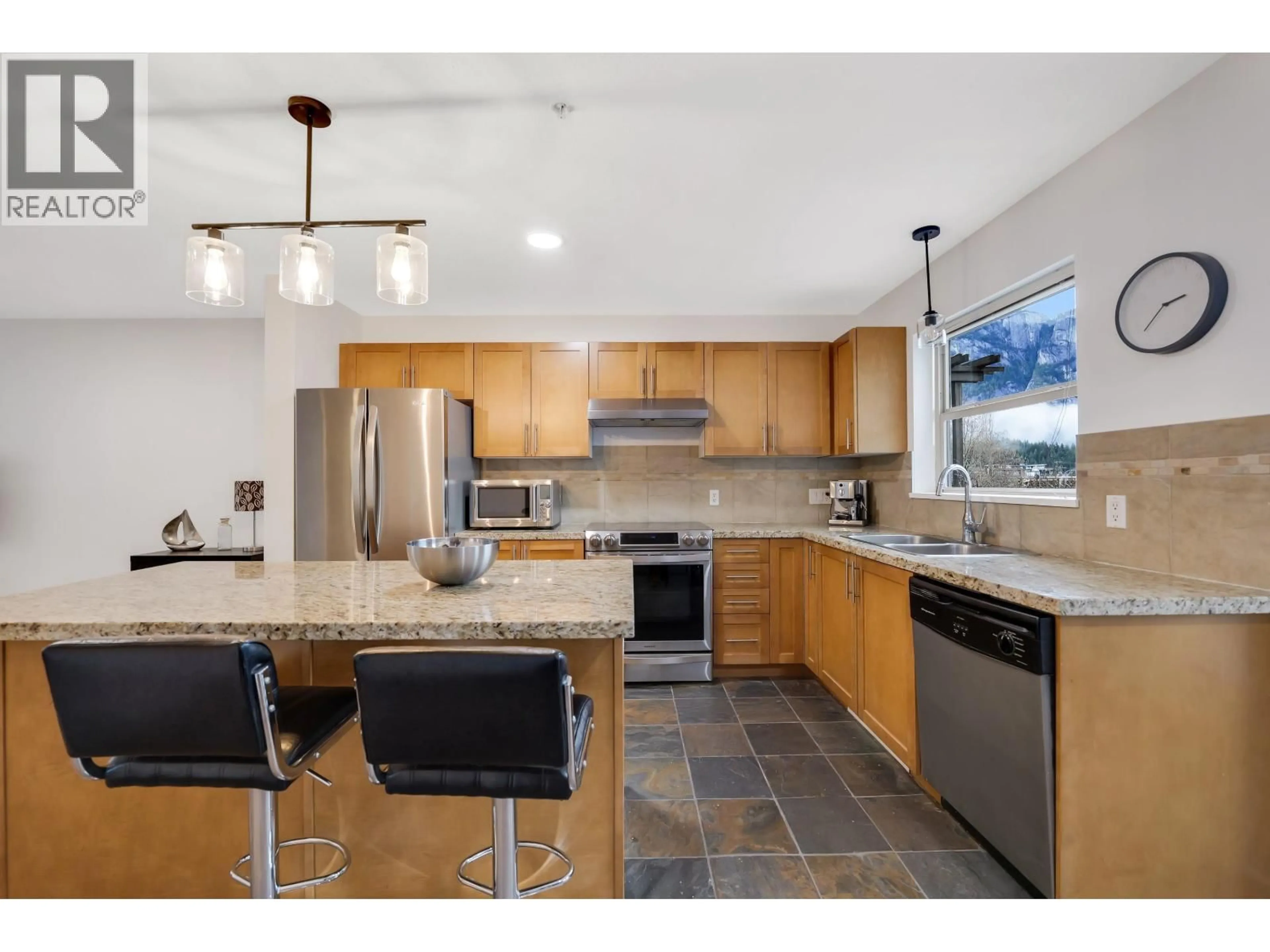 Open concept kitchen, ceramic/tile floor for 1212 VILLAGE GREEN WAY, Squamish British Columbia V8E0N5
