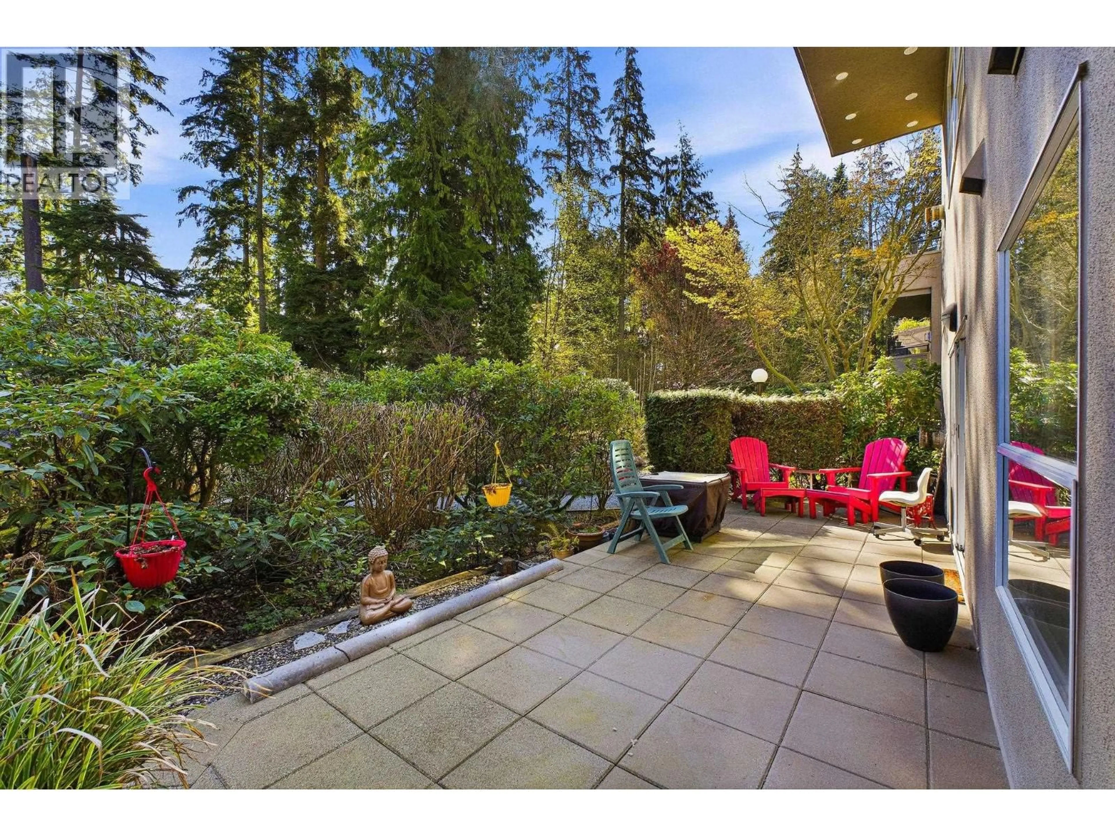 Patio, forest/trees view for 104 - 1500 OSTLER COURT, North Vancouver British Columbia V7G2C2