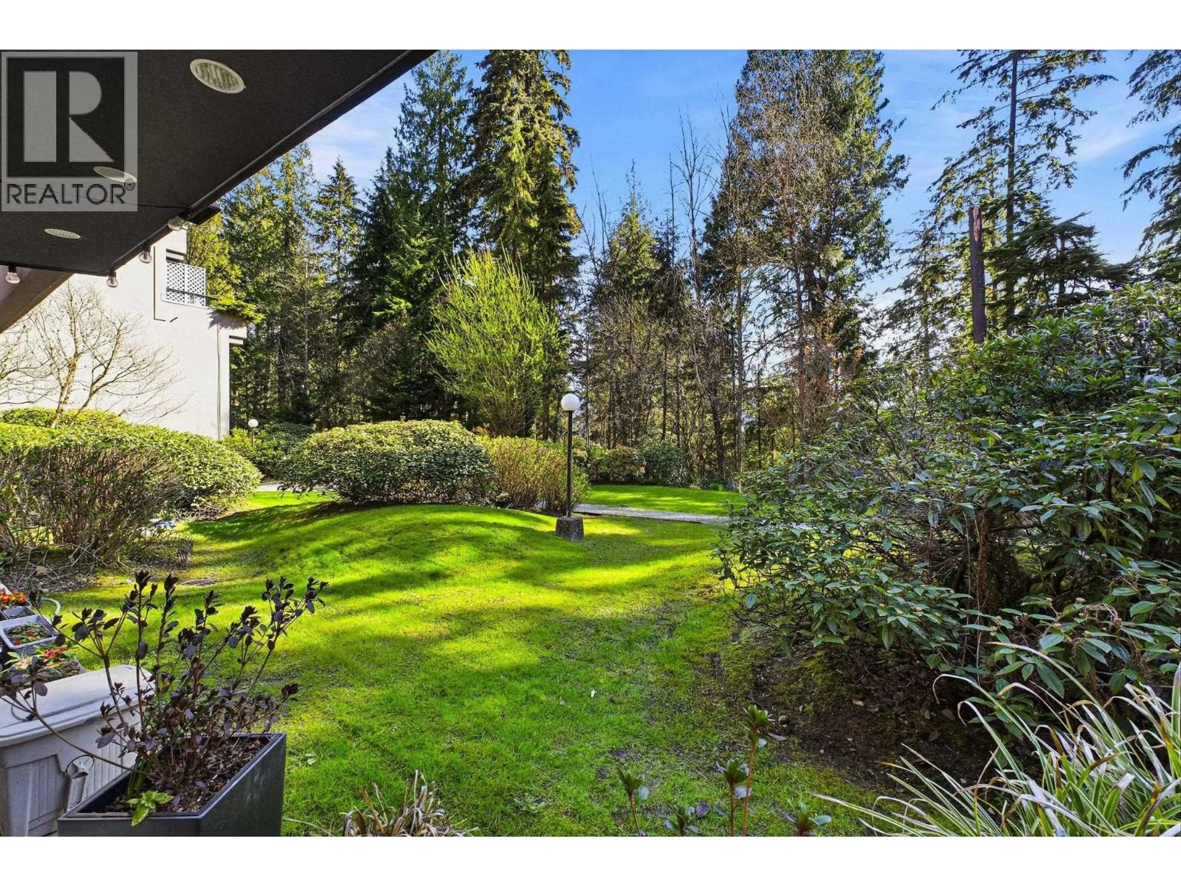 Patio, forest/trees view for 104 - 1500 OSTLER COURT, North Vancouver British Columbia V7G2C2