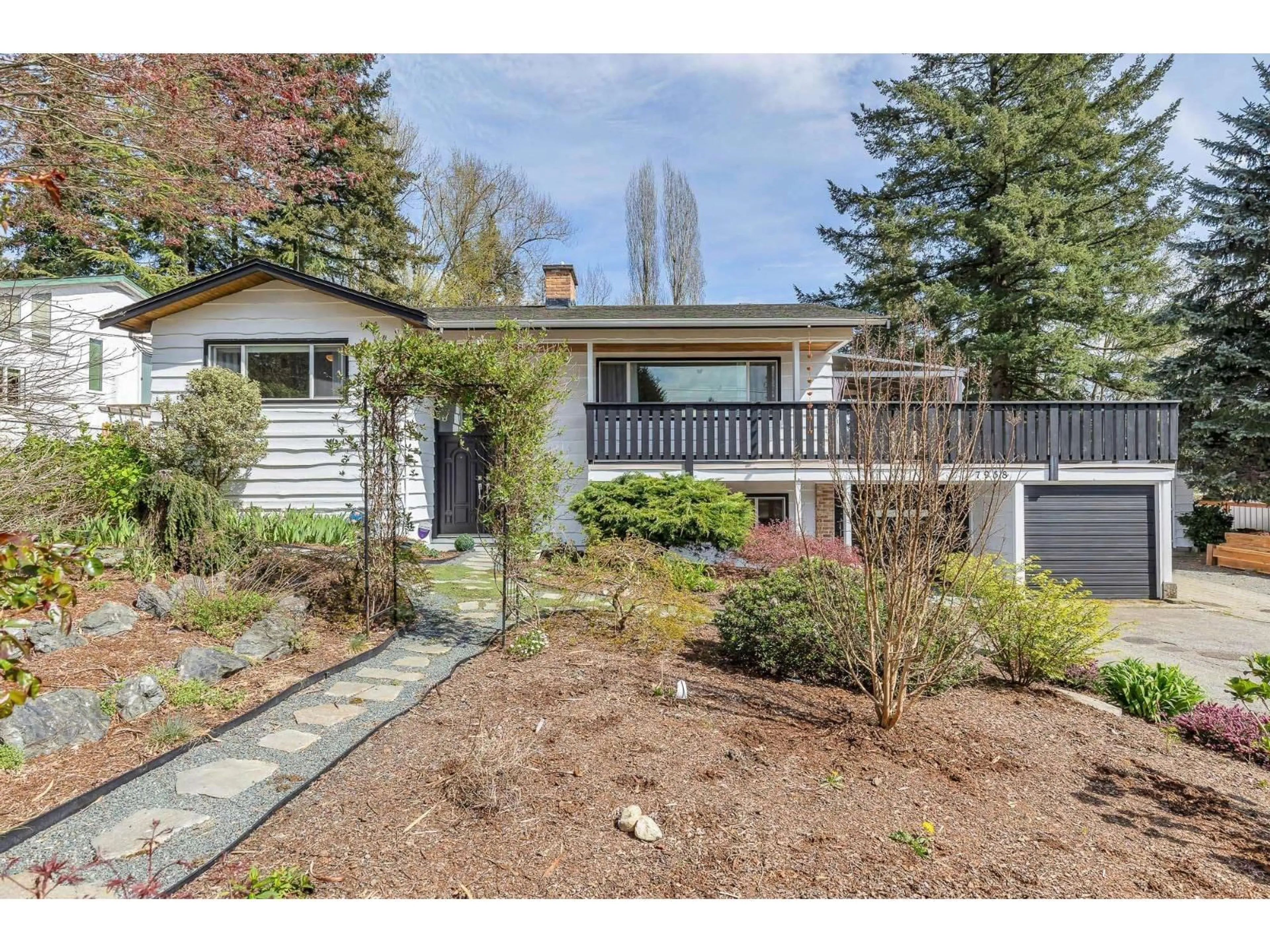 Home with vinyl exterior material, street for 7958 TAULBUT STREET, Mission British Columbia V2V3W7