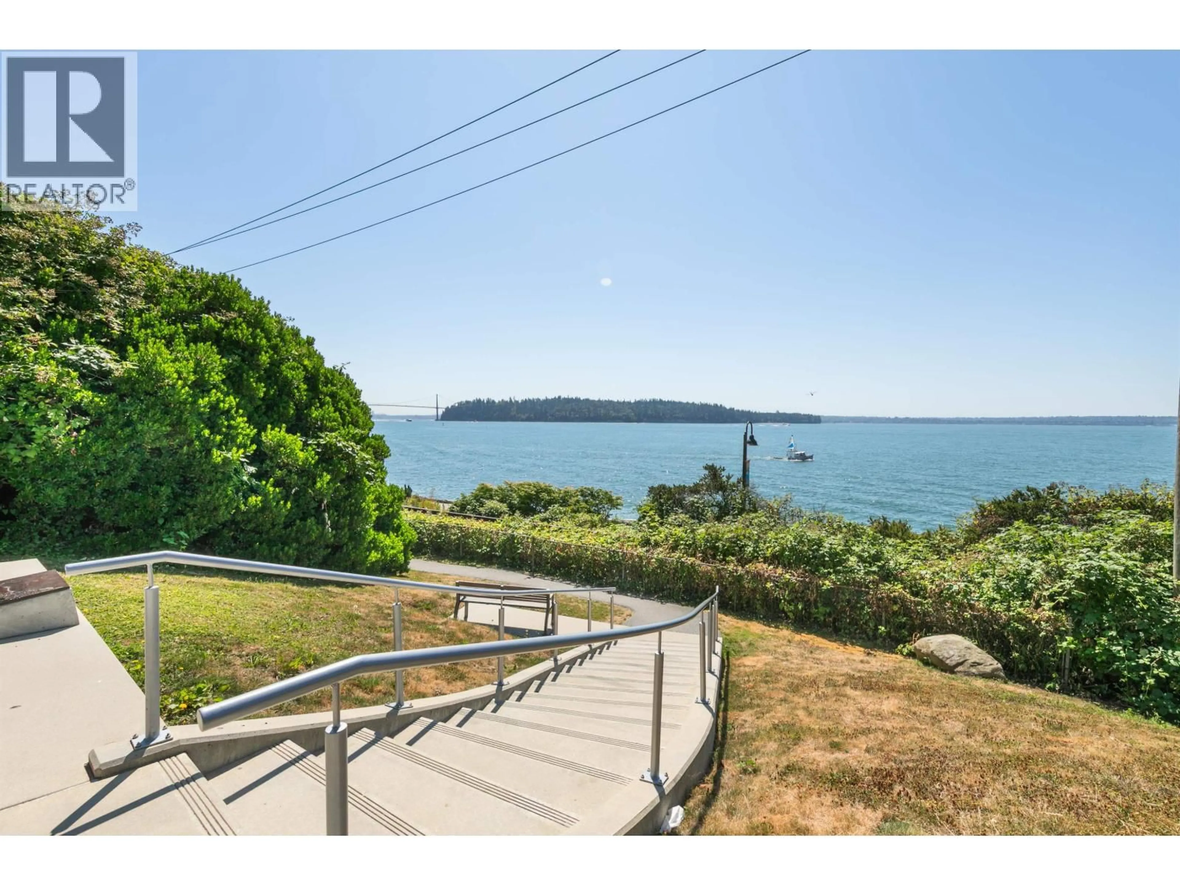 A pic from outside/outdoor area/front of a property/back of a property/a pic from drone, water/lake/river/ocean view for 208 - 2119 BELLEVUE AVENUE, West Vancouver British Columbia V7V1C2