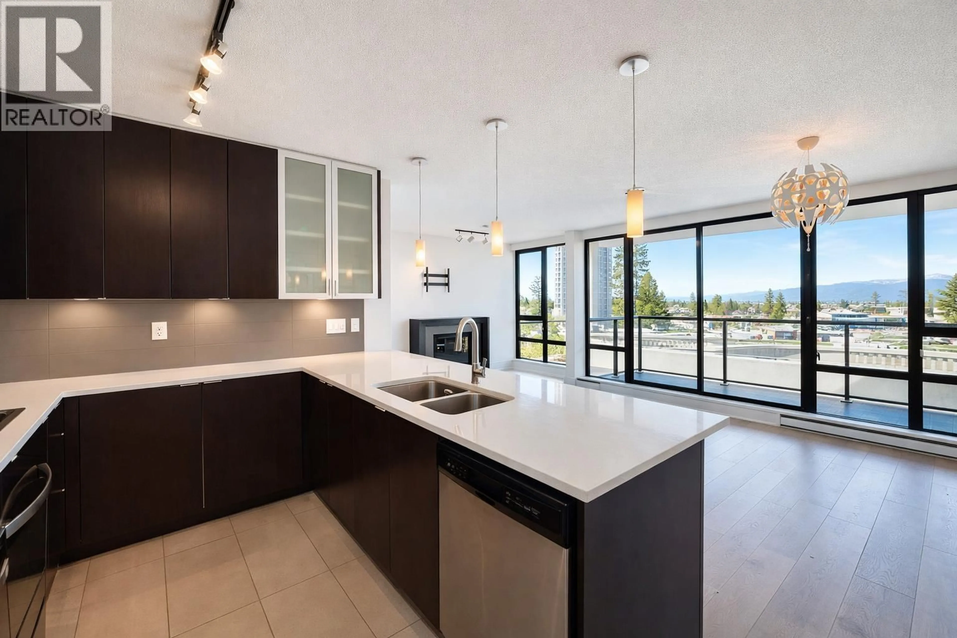 Open concept kitchen, ceramic/tile floor for 908 - 7325 ARCOLA STREET, Burnaby British Columbia V5E0A8