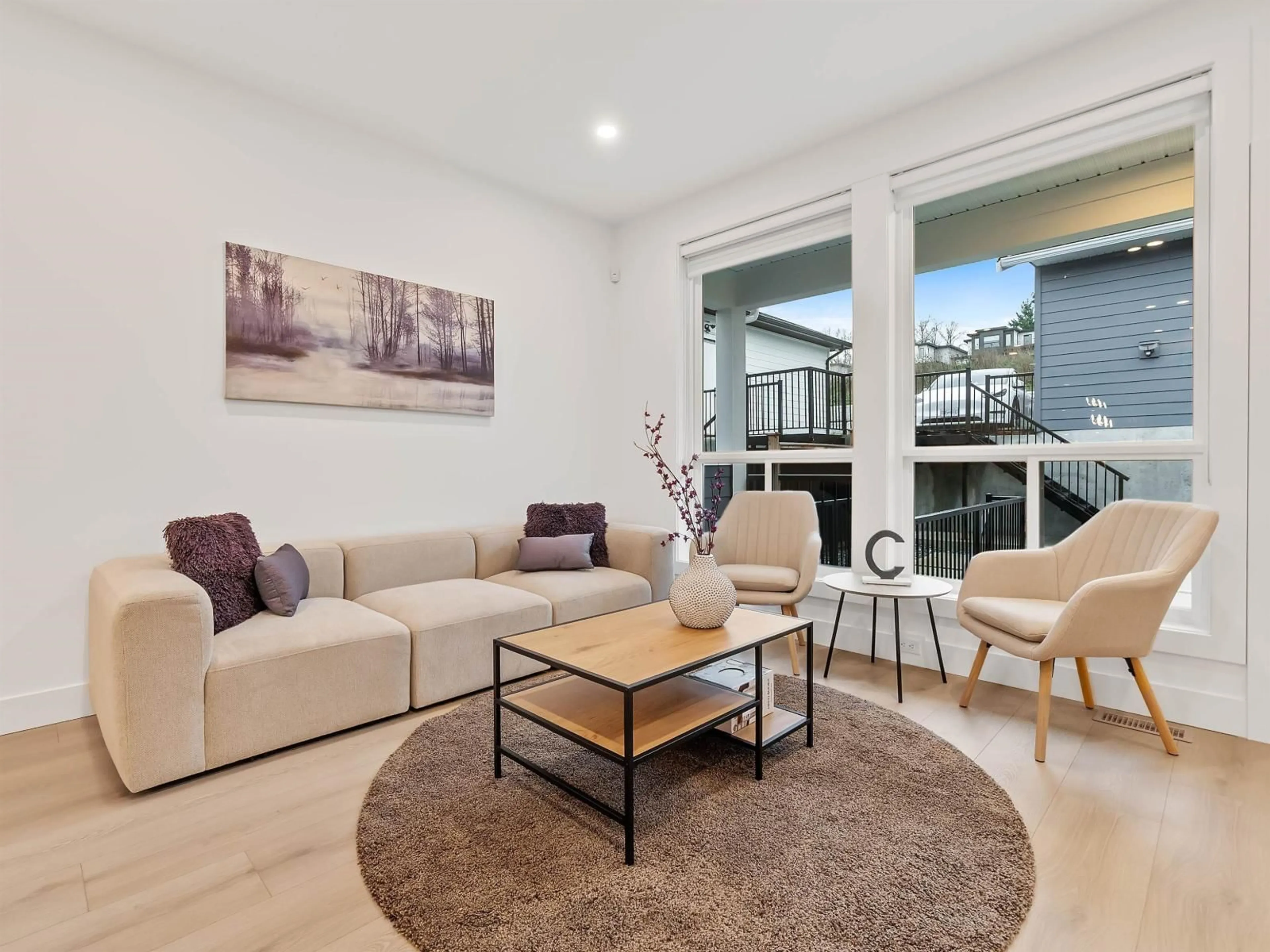 Living room with furniture, wood/laminate floor for 102 - 16693 16 AVENUE, Surrey British Columbia V3S9X7