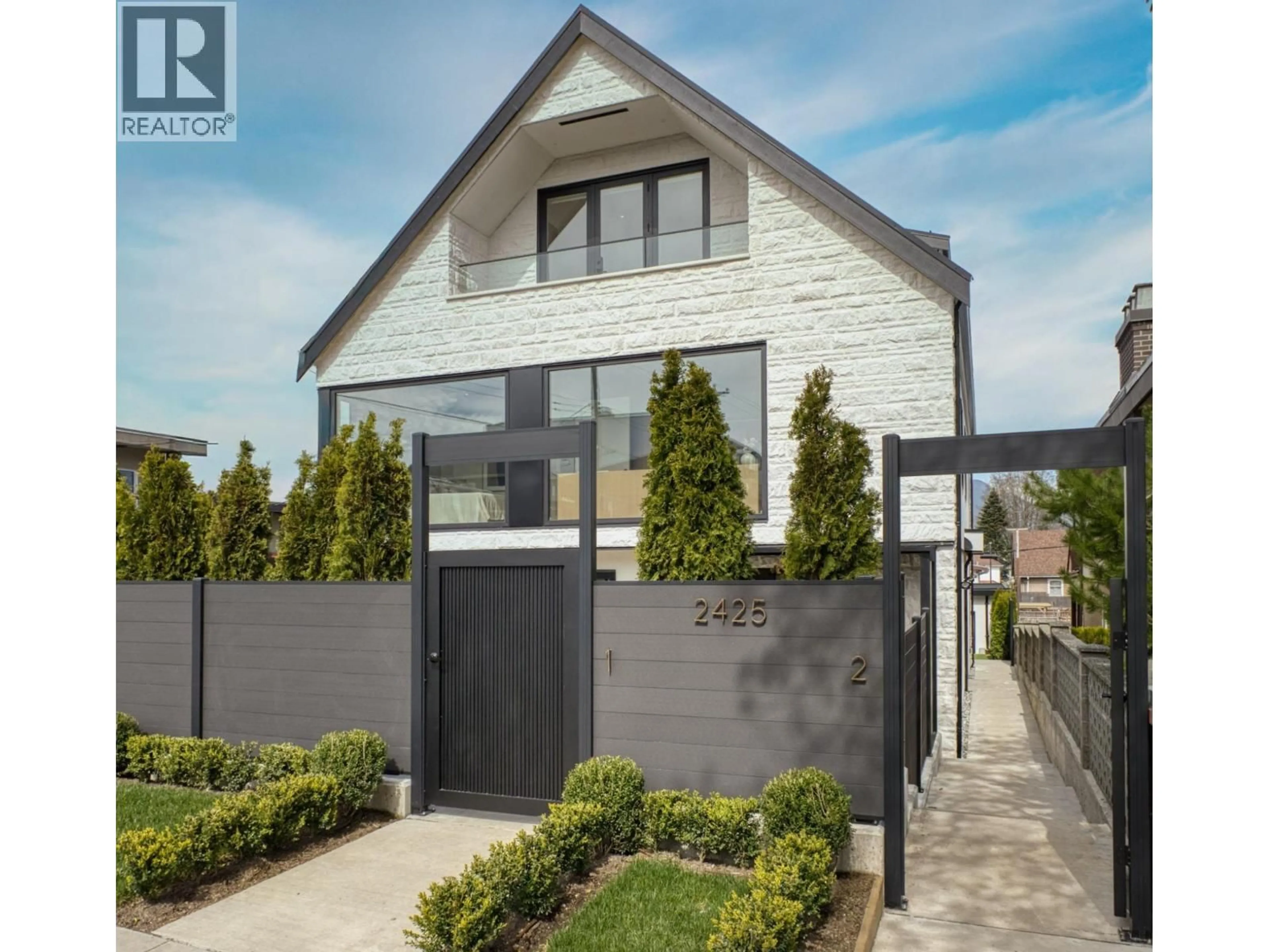 Home with brick exterior material, street for 2 - 2425 KITCHENER STREET, Vancouver British Columbia V5K3C4