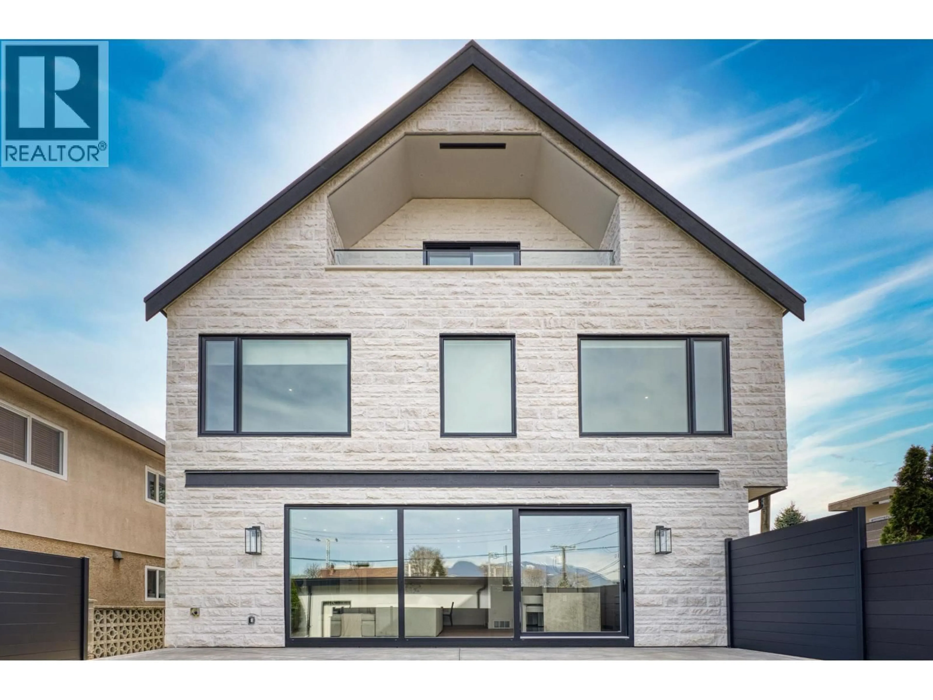 Home with brick exterior material, building for 2 - 2425 KITCHENER STREET, Vancouver British Columbia V5K3C4