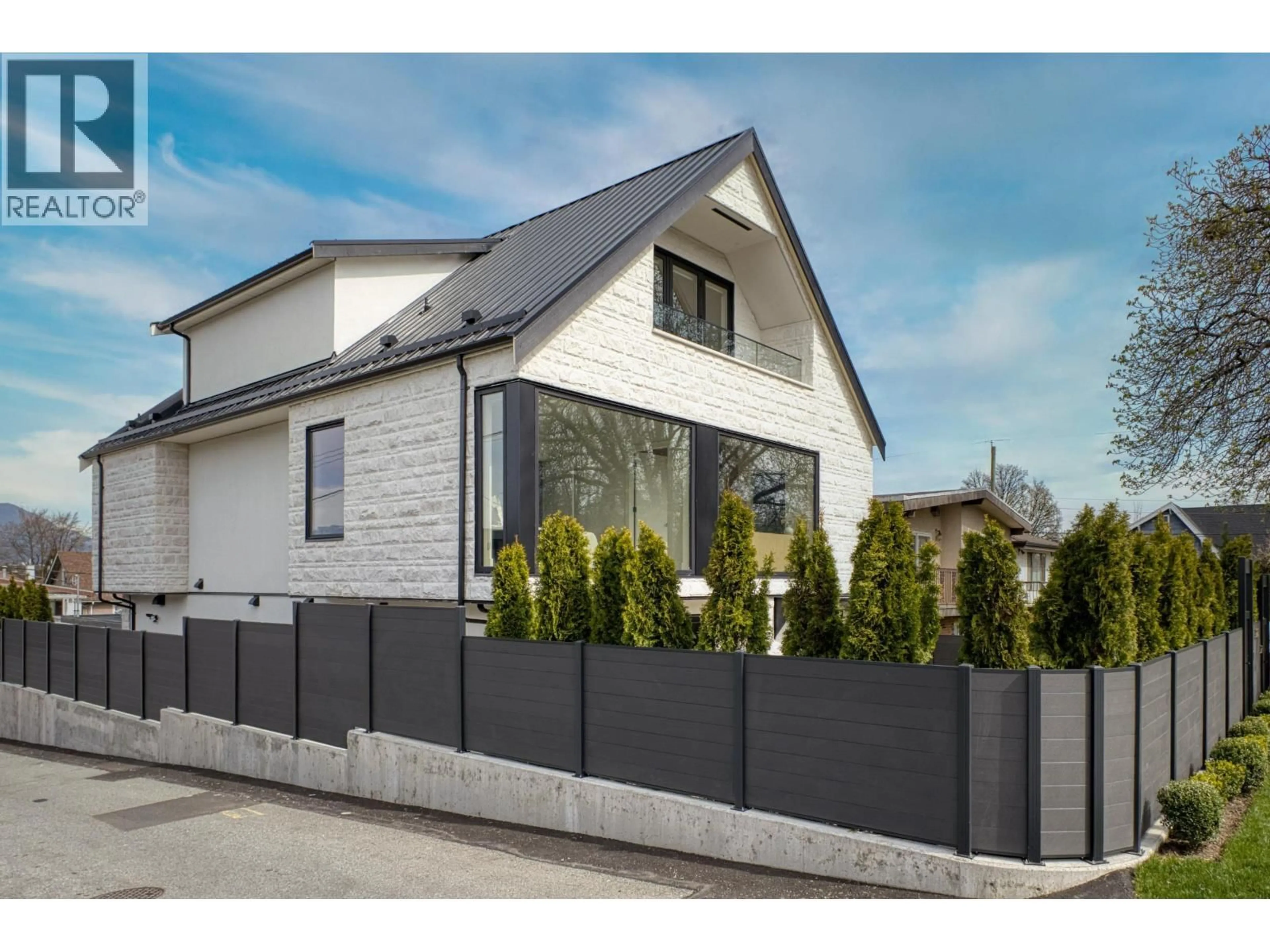 Home with vinyl exterior material, street for 1 - 2425 KITCHENER STREET, Vancouver British Columbia V5K3C4