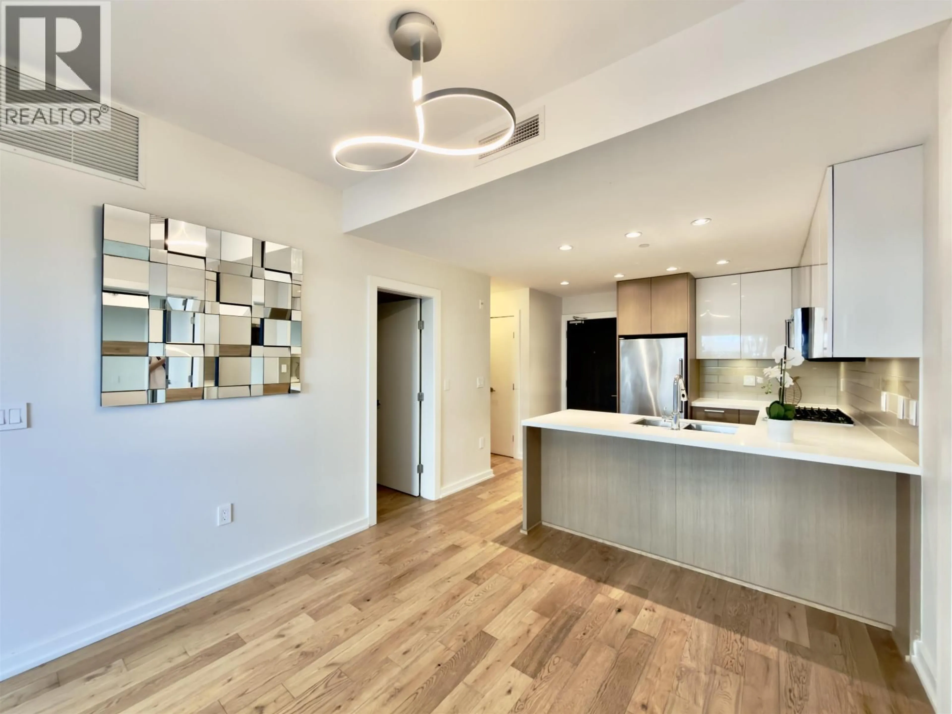 Open concept kitchen, unknown for 128 - 5311 CEDARBRIDGE WAY, Richmond British Columbia V6X0L6