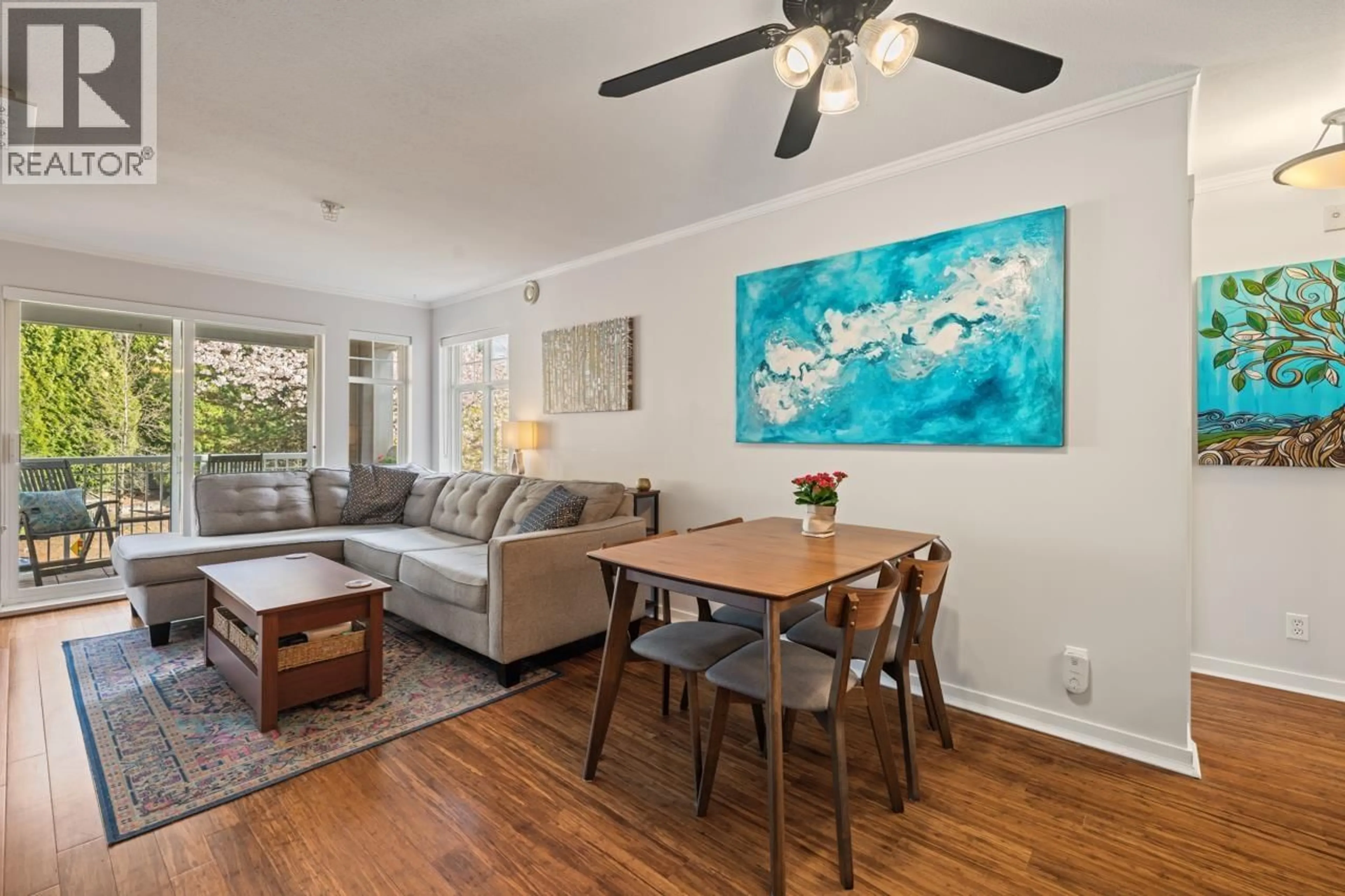 Living room with furniture, wood/laminate floor for 310 - 1428 PARKWAY BOULEVARD, Coquitlam British Columbia V3E3L8