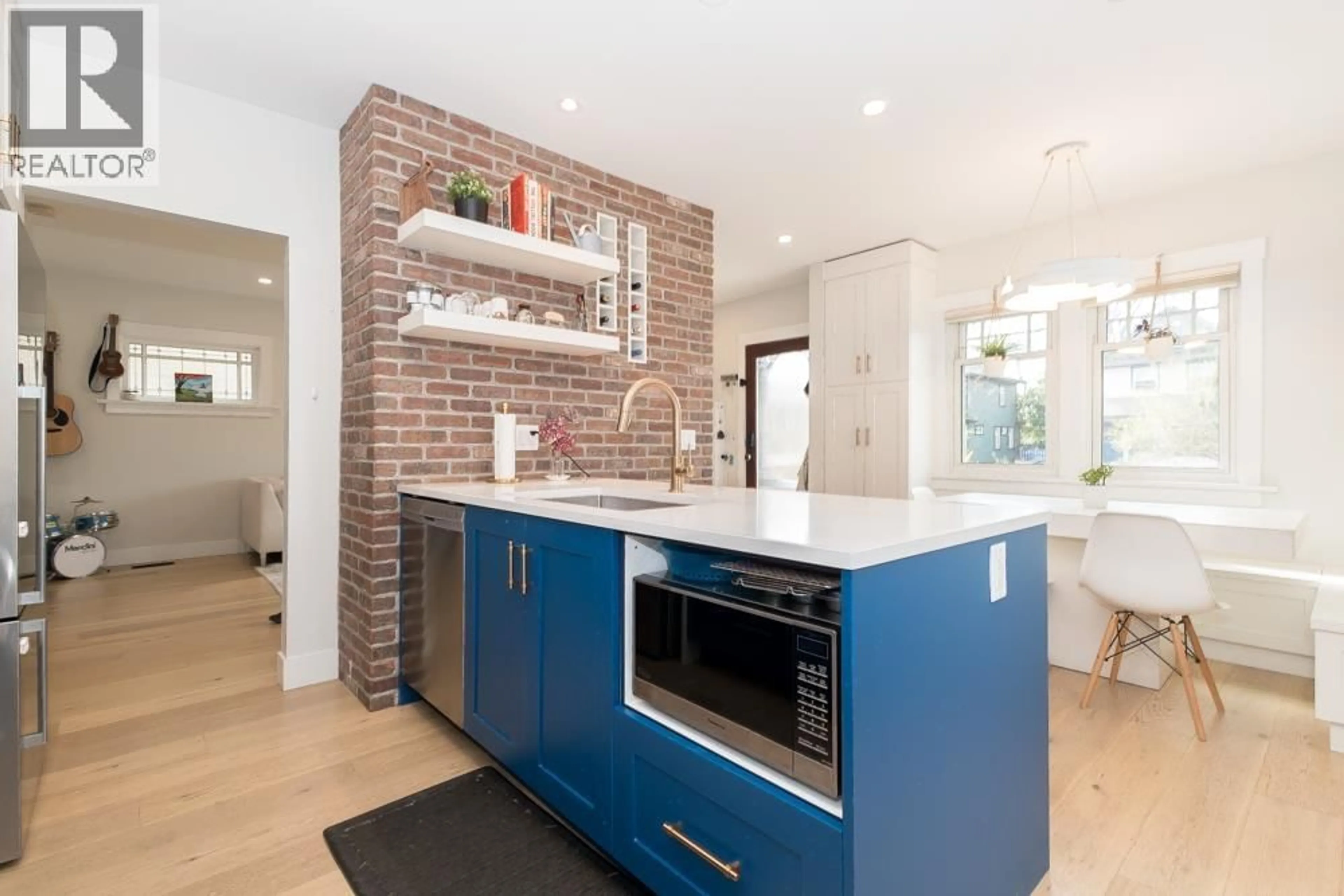 Contemporary kitchen, ceramic/tile floor for 1610 SALSBURY DRIVE, Vancouver British Columbia V5L4B8