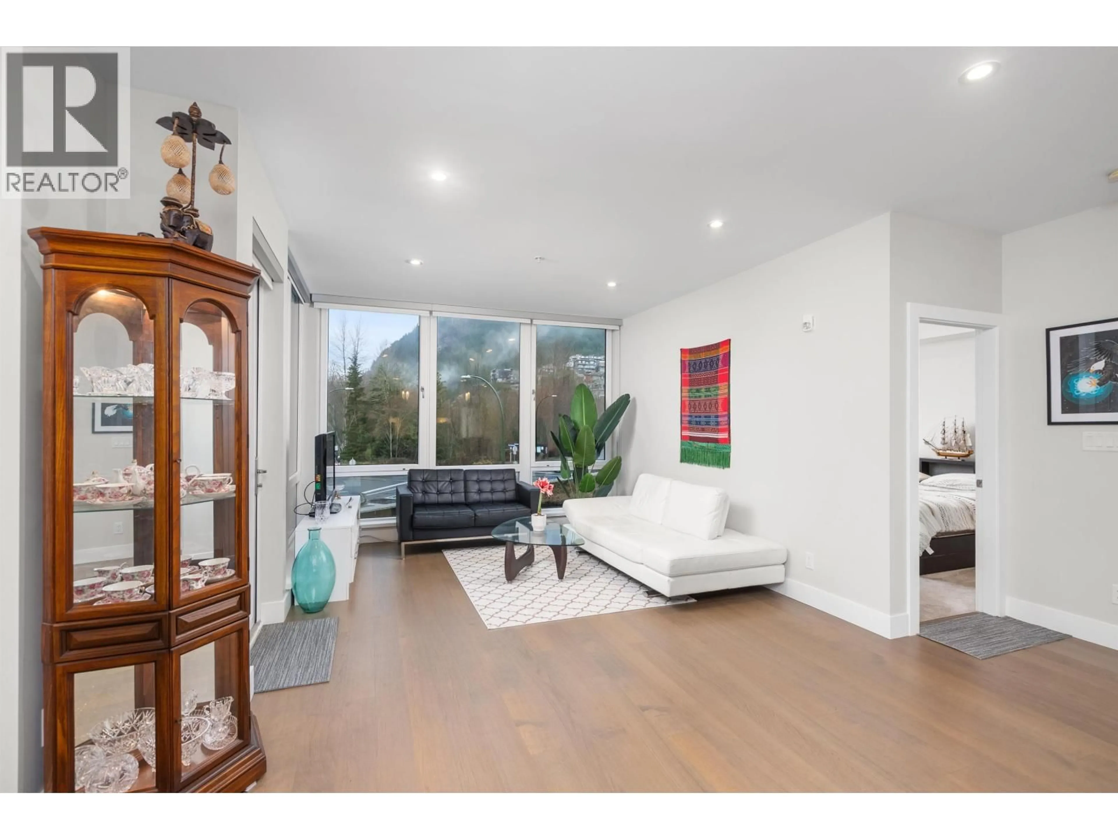 Living room with furniture, unknown for 220 - 1870 DOWAD DRIVE, Squamish British Columbia V8B1C4