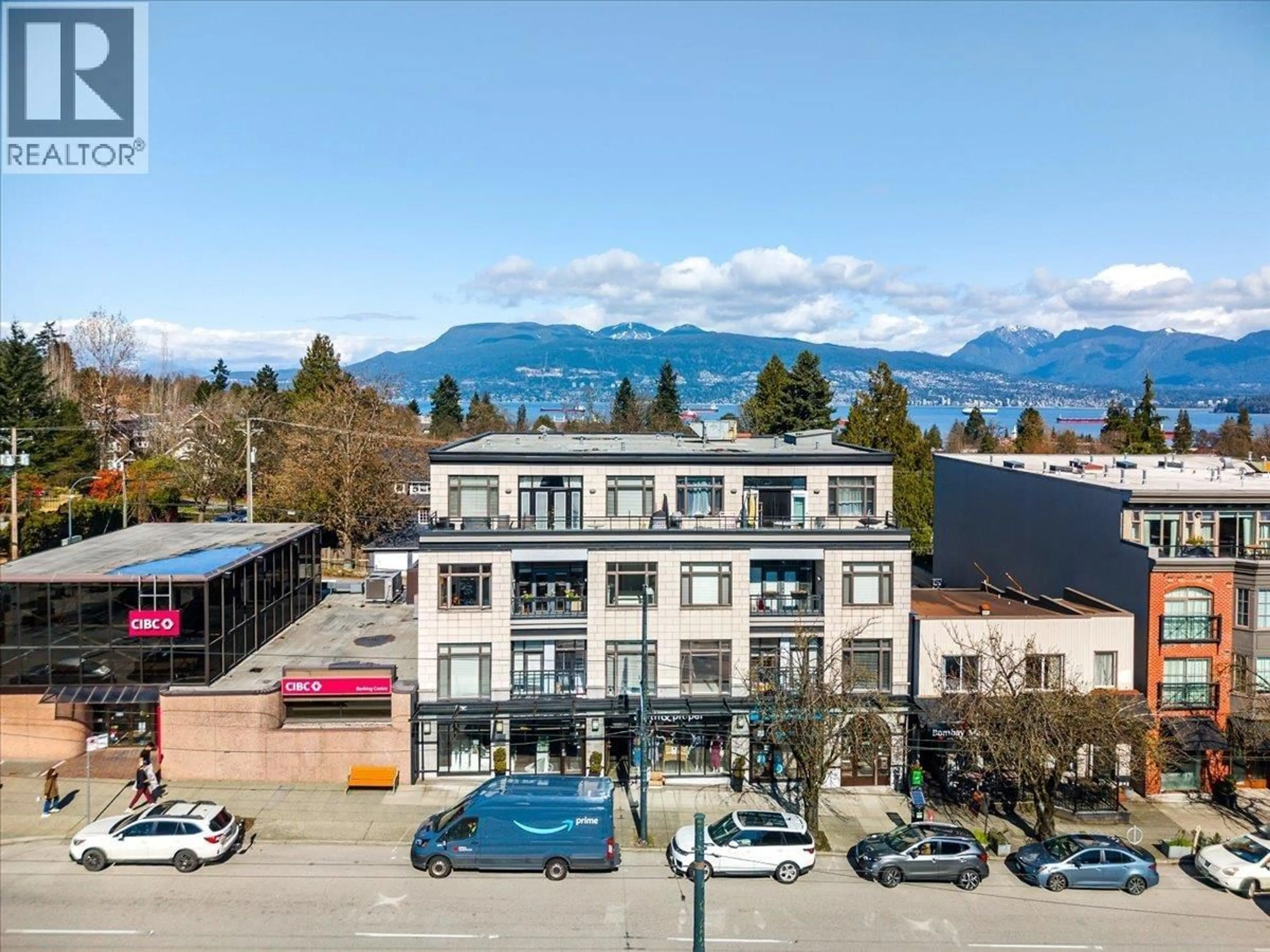 A pic from outside/outdoor area/front of a property/back of a property/a pic from drone, mountain view for 302 - 4479 10TH AVENUE, Vancouver British Columbia V6R2H8