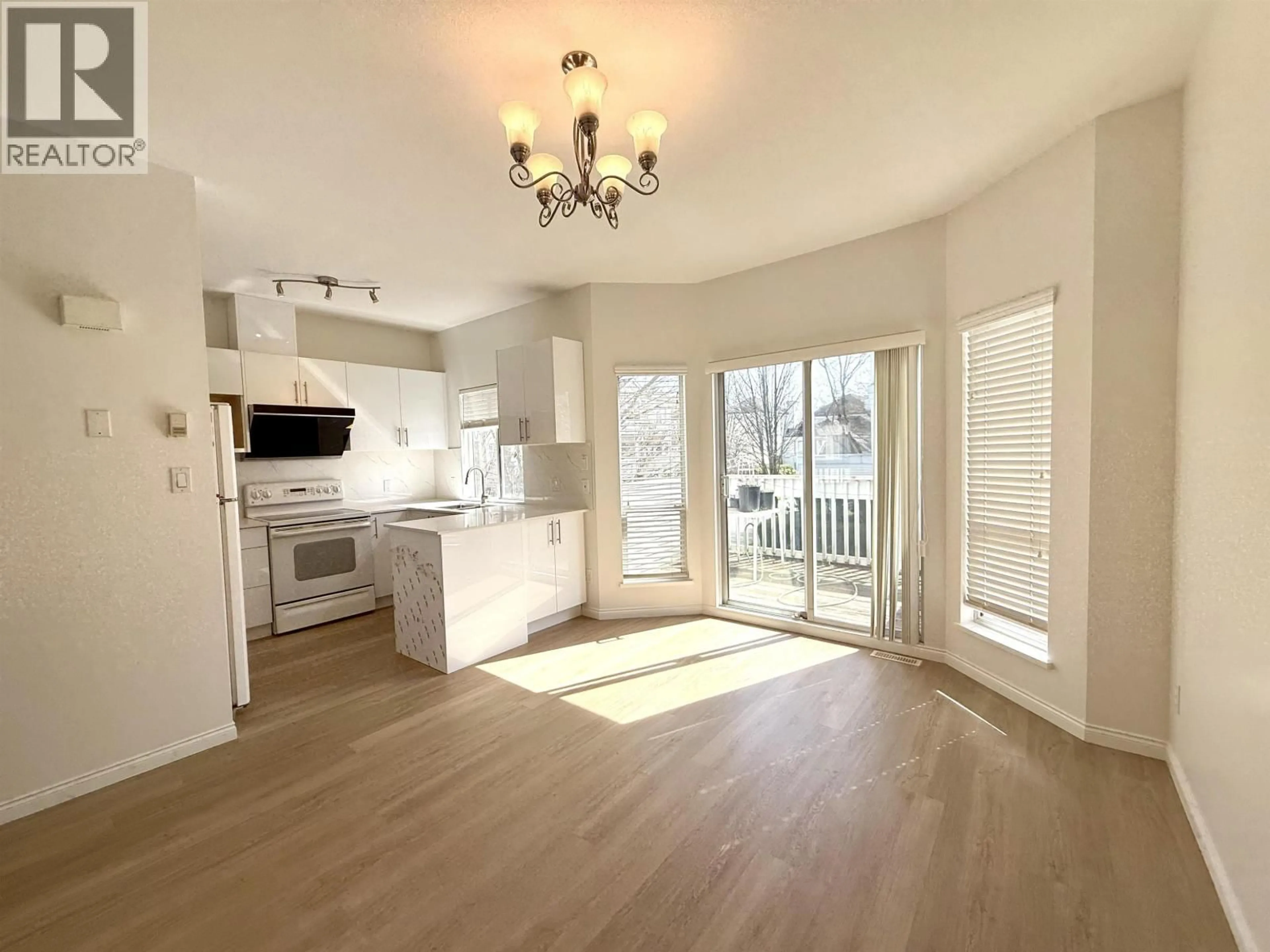 Open concept kitchen, wood/laminate floor for 79 - 12500 MCNEELY DRIVE, Richmond British Columbia V6V2S4