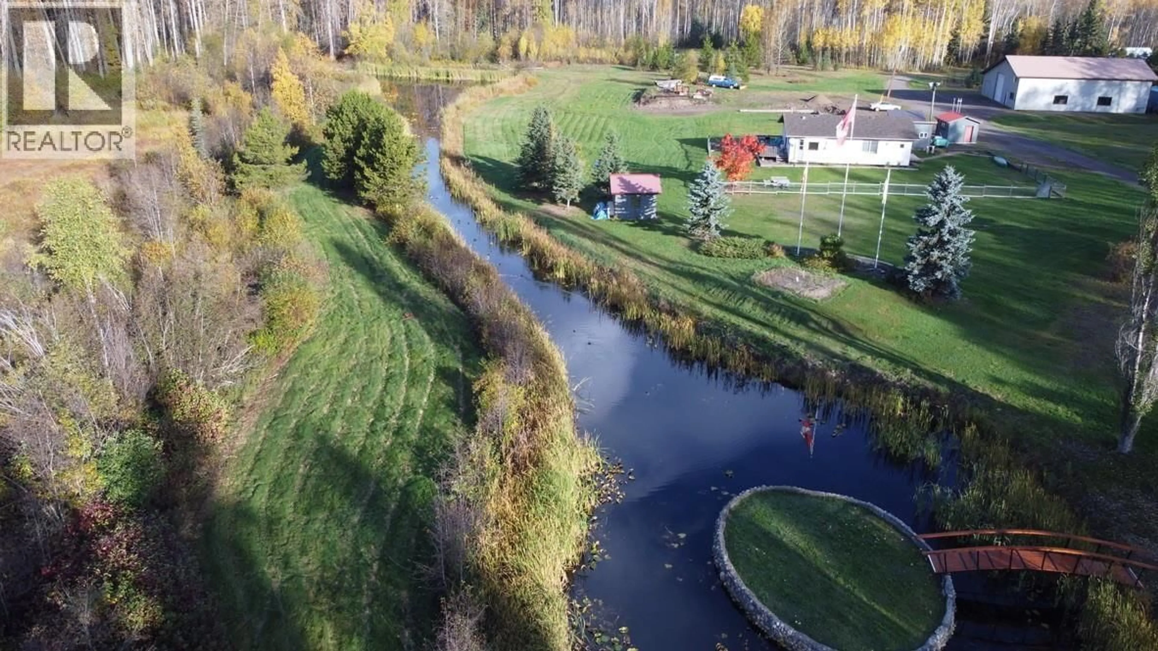 A pic from outside/outdoor area/front of a property/back of a property/a pic from drone, water/lake/river/ocean view for 1055 HUDSON BAY MOUNTAIN ROAD, Smithers British Columbia V0J2N4