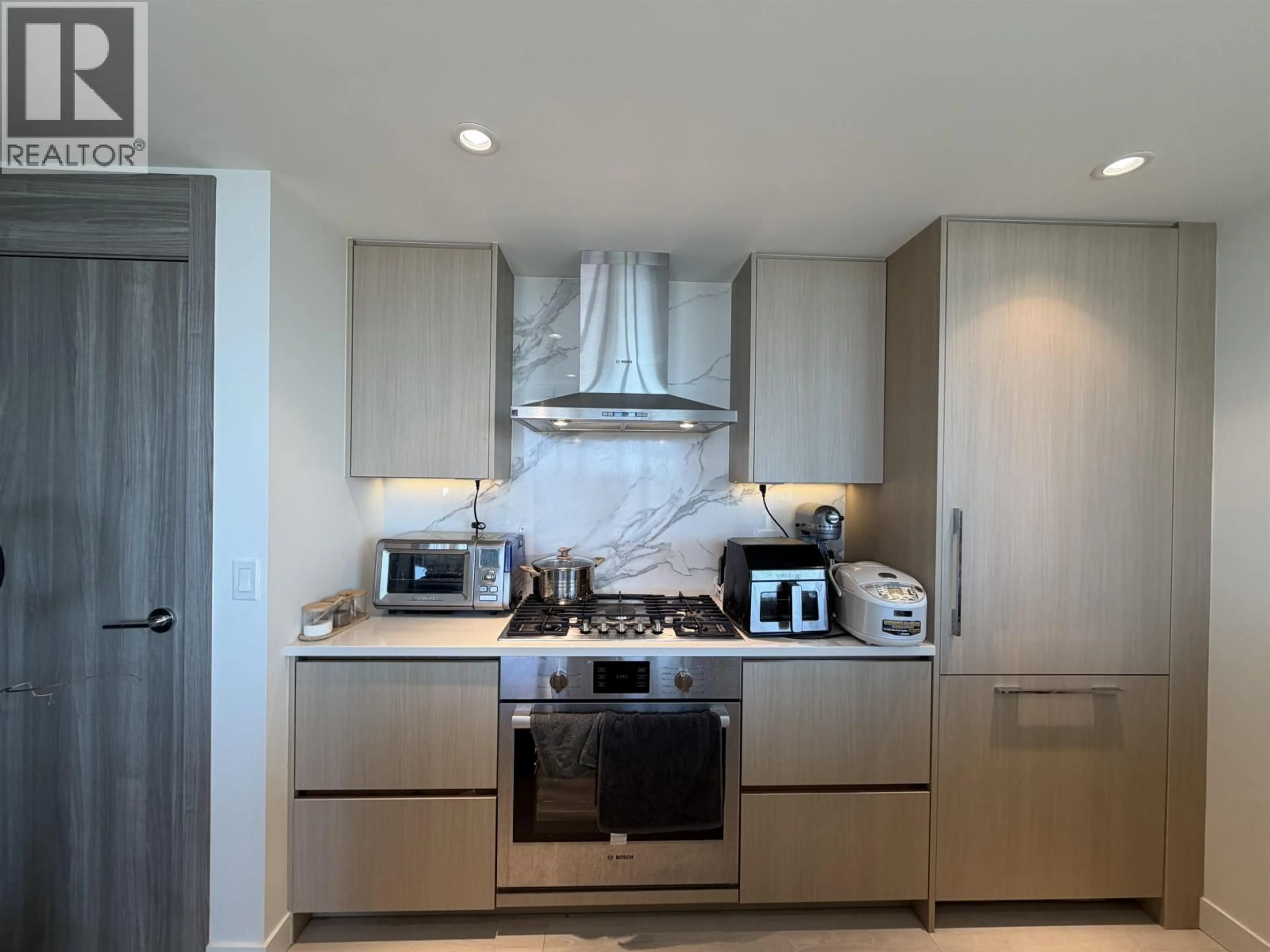 Contemporary kitchen, ceramic/tile floor for 1001 - 8611 HAZELBRIDGE WAY, Richmond British Columbia V6X0W8