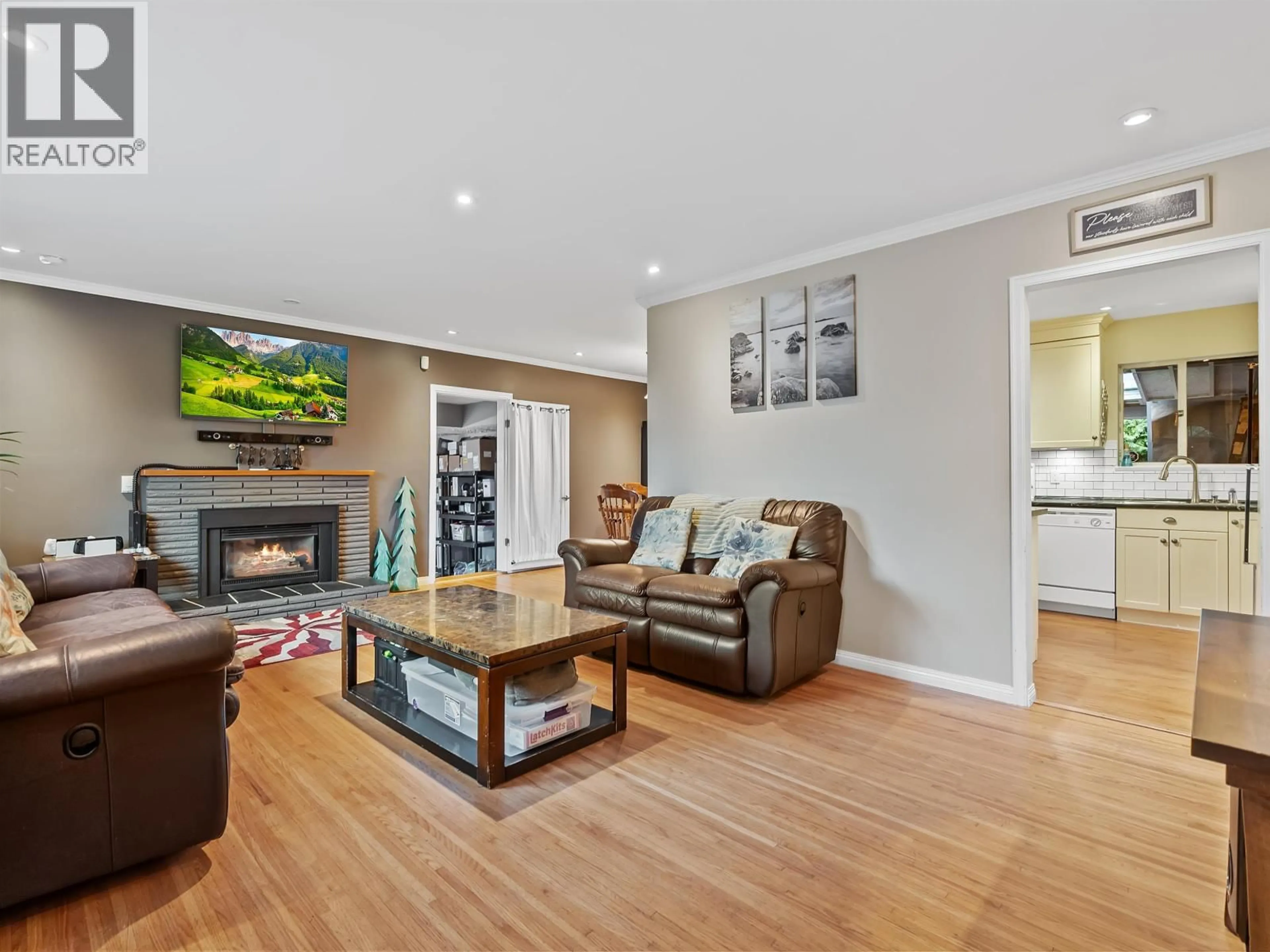 Living room with furniture, wood/laminate floor for 4921 44A AVENUE, Delta British Columbia V4K1E6