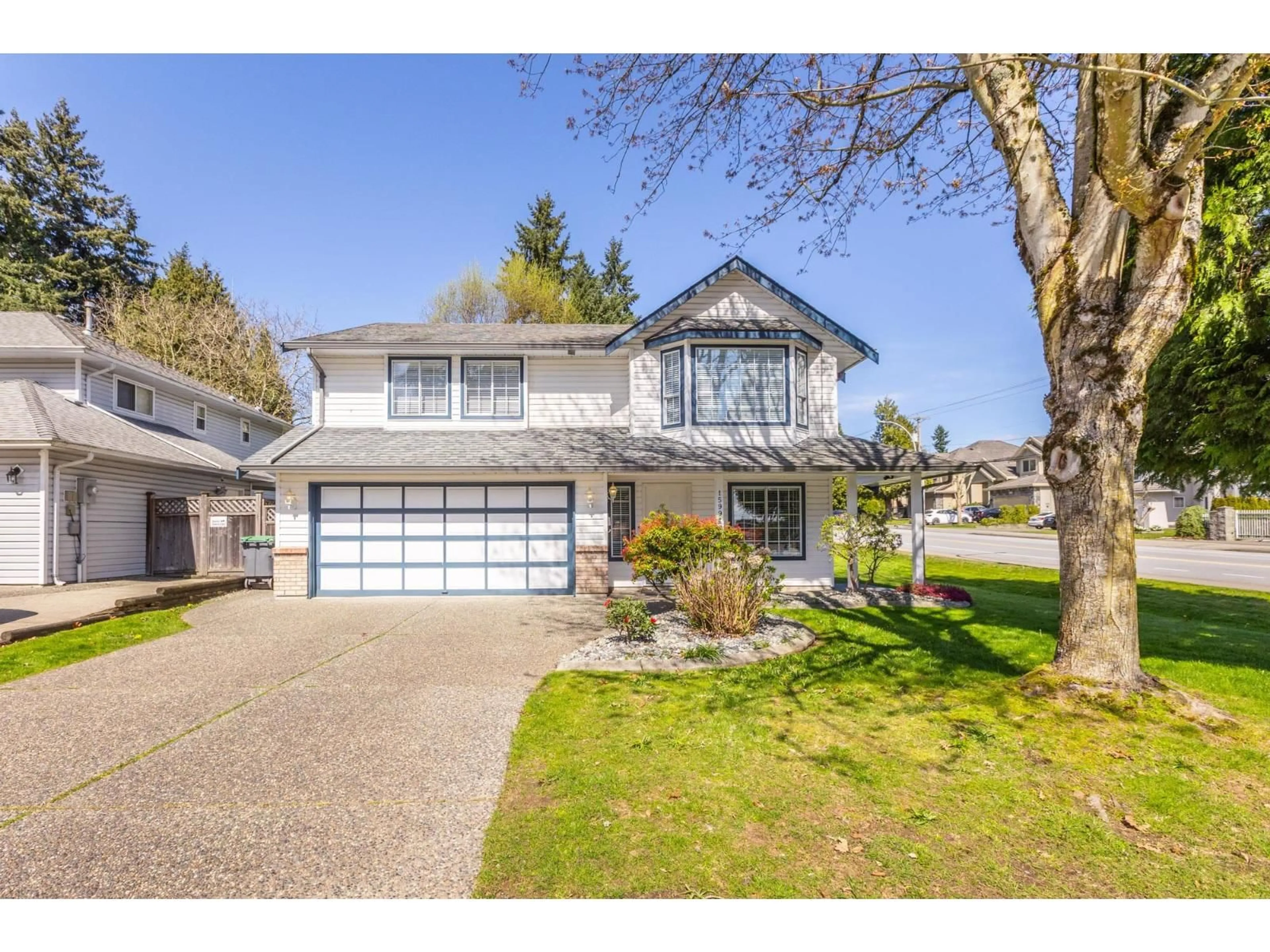 Home with vinyl exterior material, street for 15991 80 AVENUE, Surrey British Columbia V4N0V2