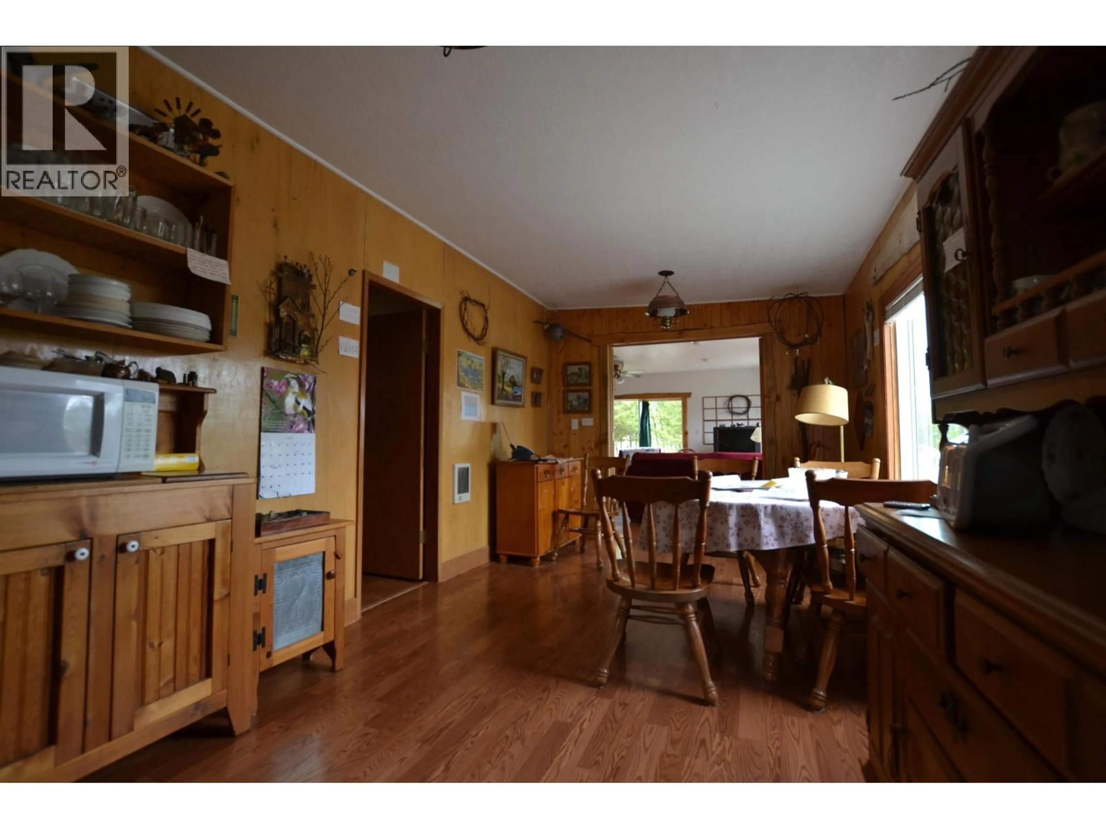 Dining room, wood/laminate floor for 4008 PUNTZI LAKE ROAD, Williams Lake British Columbia V0L1H0