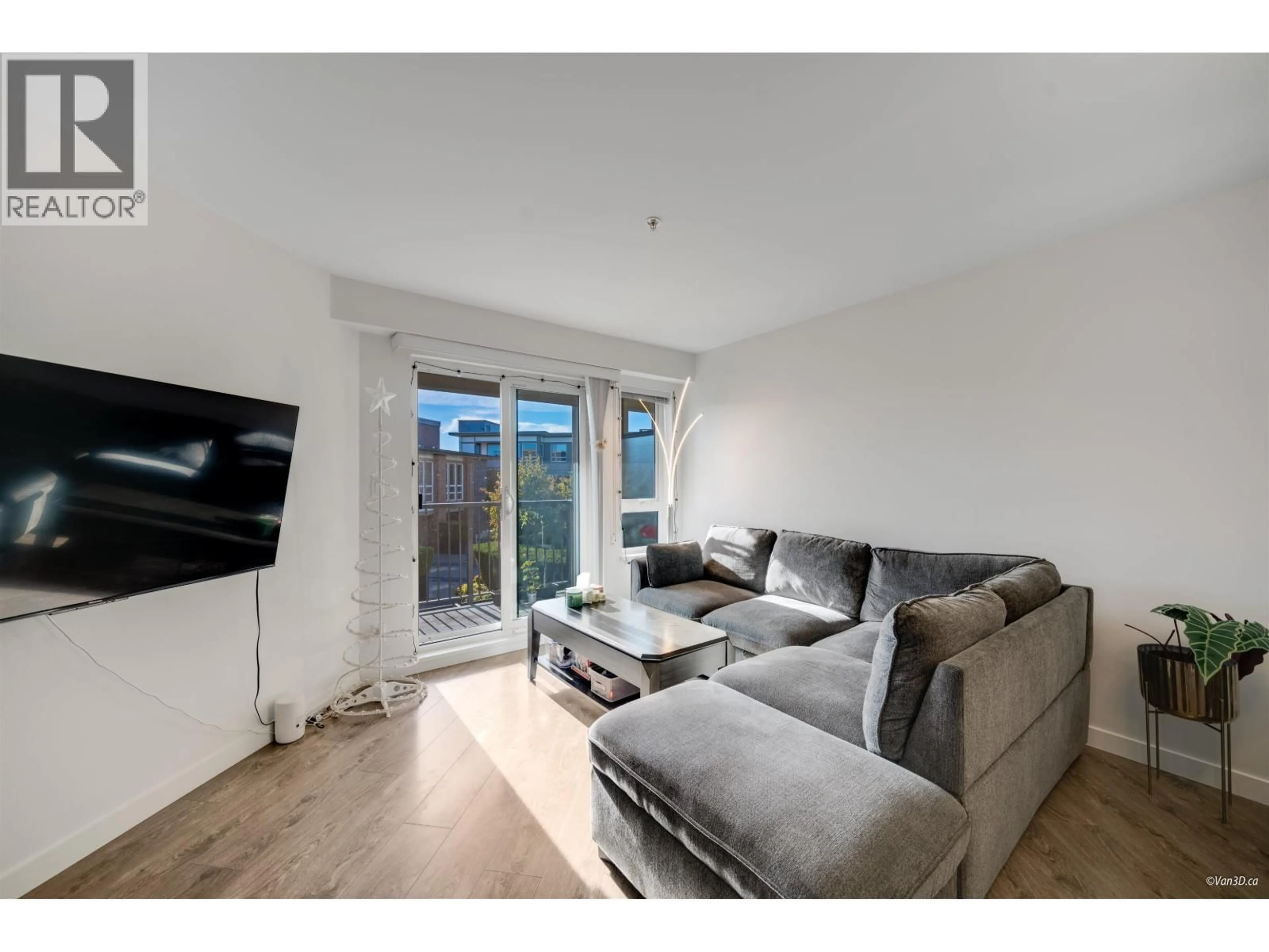 Living room with furniture, wood/laminate floor for 316 - 12339 STEVESTON HIGHWAY, Richmond British Columbia V6W0B4