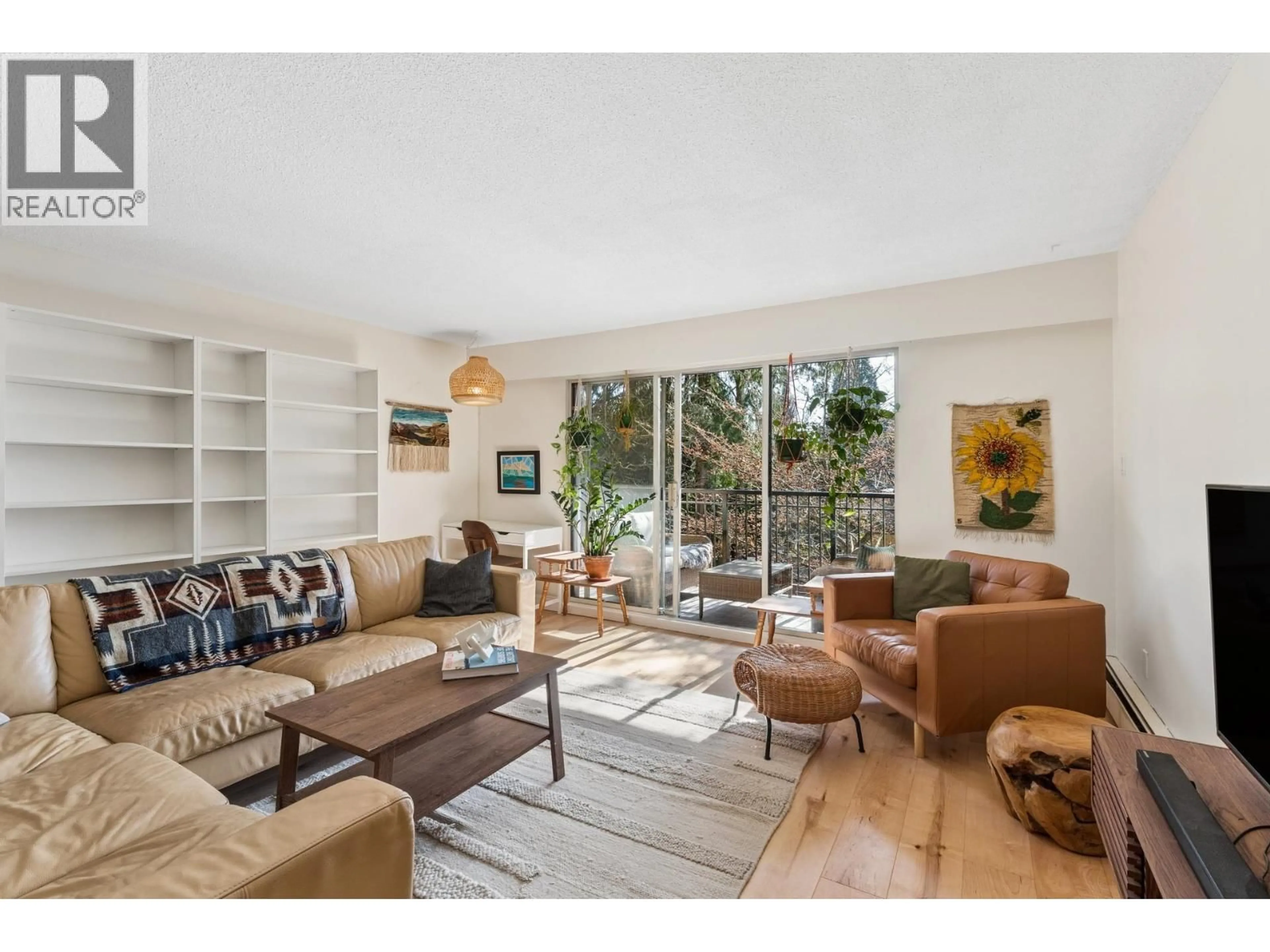 Living room with furniture, unknown for 211 - 1385 DRAYCOTT ROAD, North Vancouver British Columbia V7J3K9