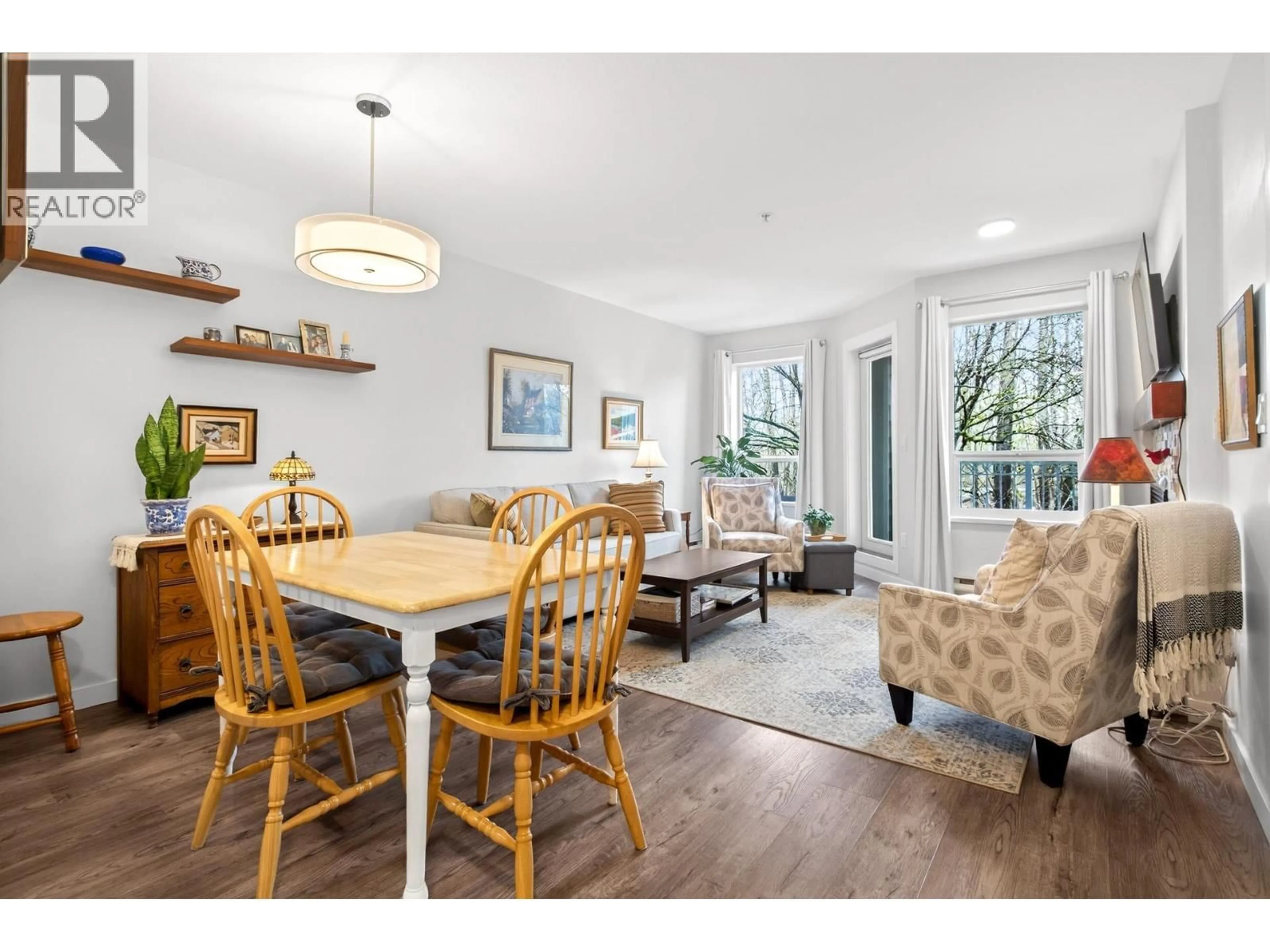 Dining room, wood/laminate floor for 205 - 2439 WILSON AVENUE, Port Coquitlam British Columbia V3C6H6