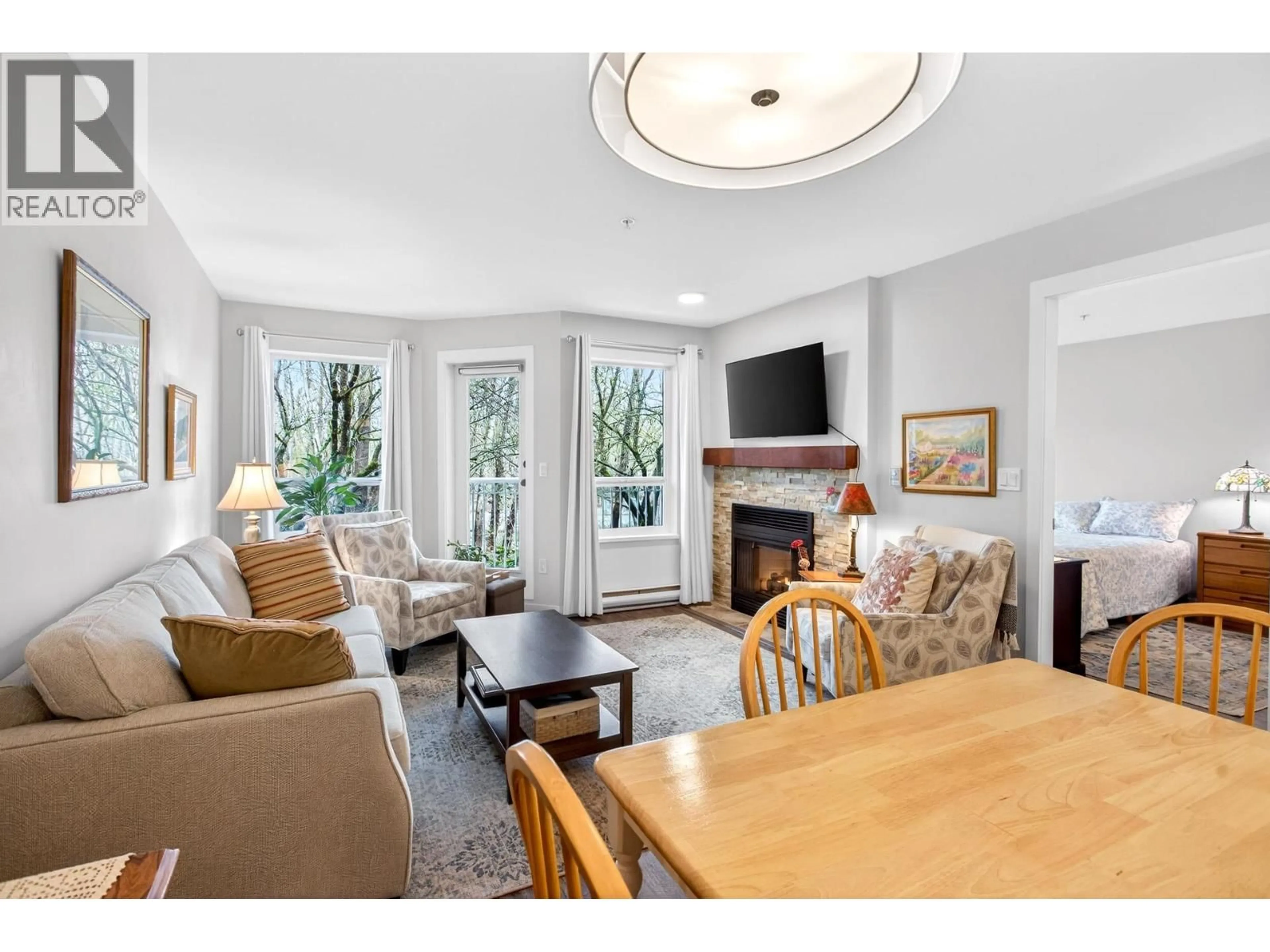 Living room with furniture, unknown for 205 - 2439 WILSON AVENUE, Port Coquitlam British Columbia V3C6H6