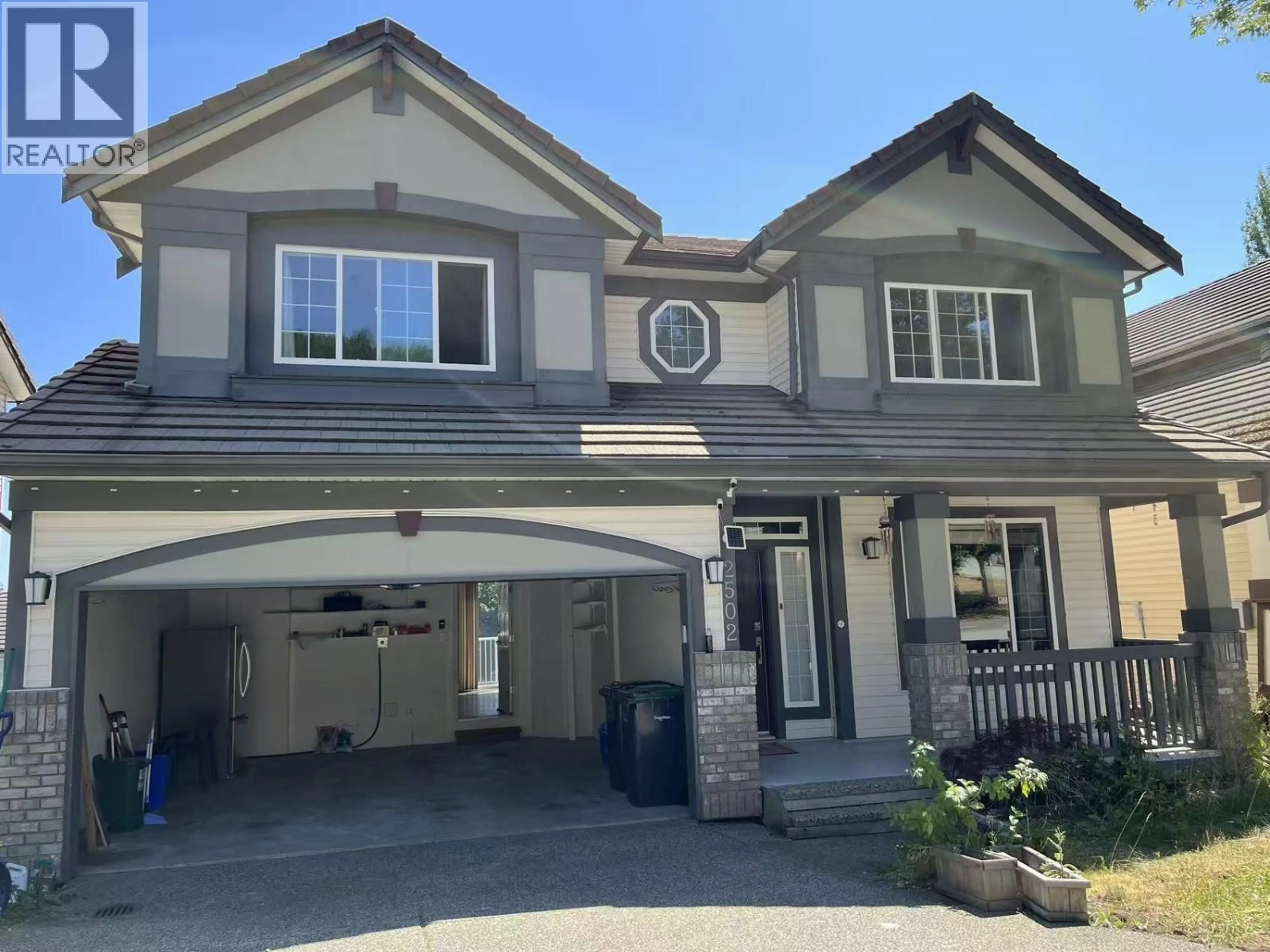Home with vinyl exterior material, street for 2502 QUARTZ PLACE, Coquitlam British Columbia V3E3K9