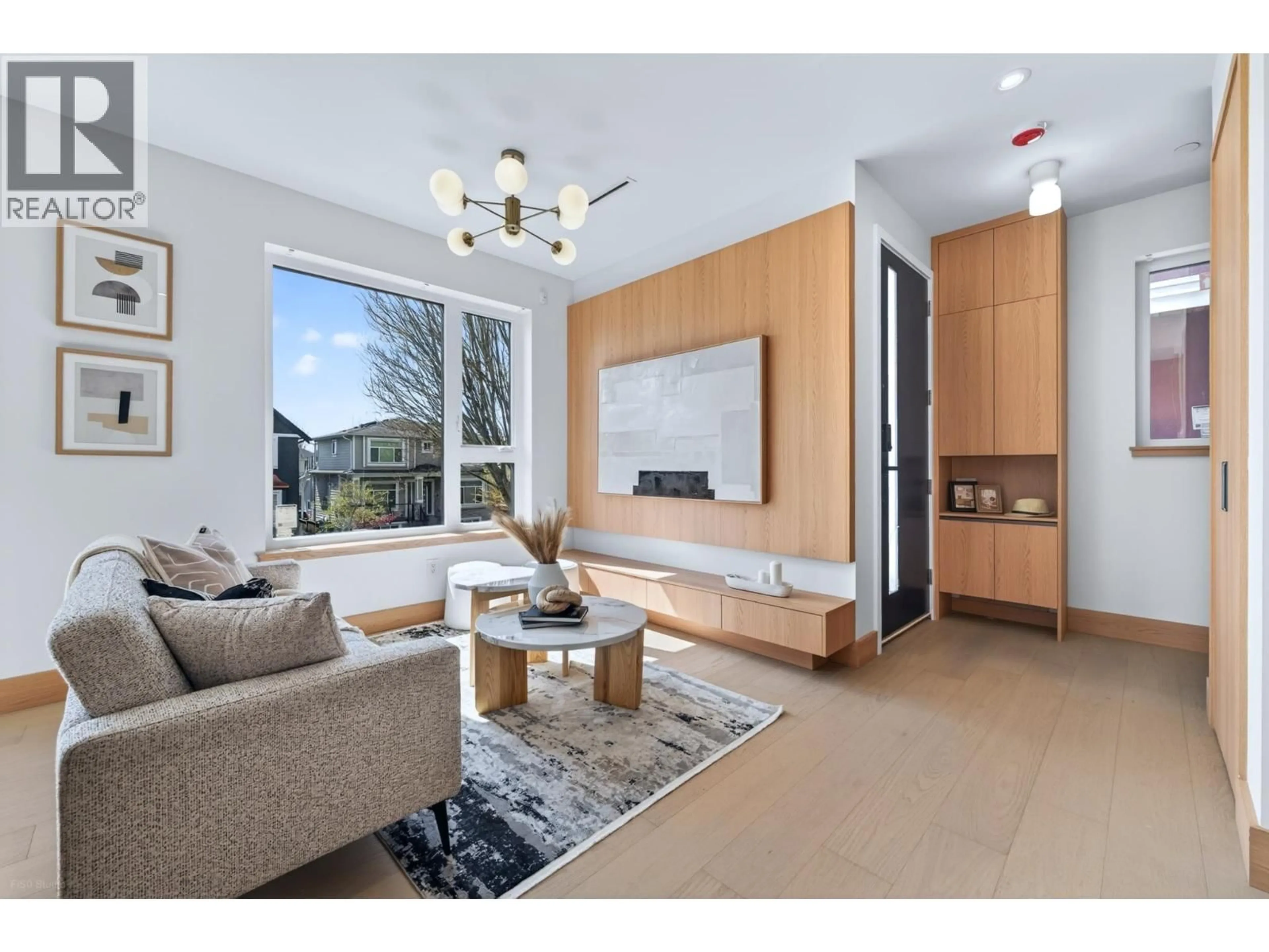 Living room with furniture, wood/laminate floor for 2 - 1495 58TH AVENUE, Vancouver British Columbia V5P2B9