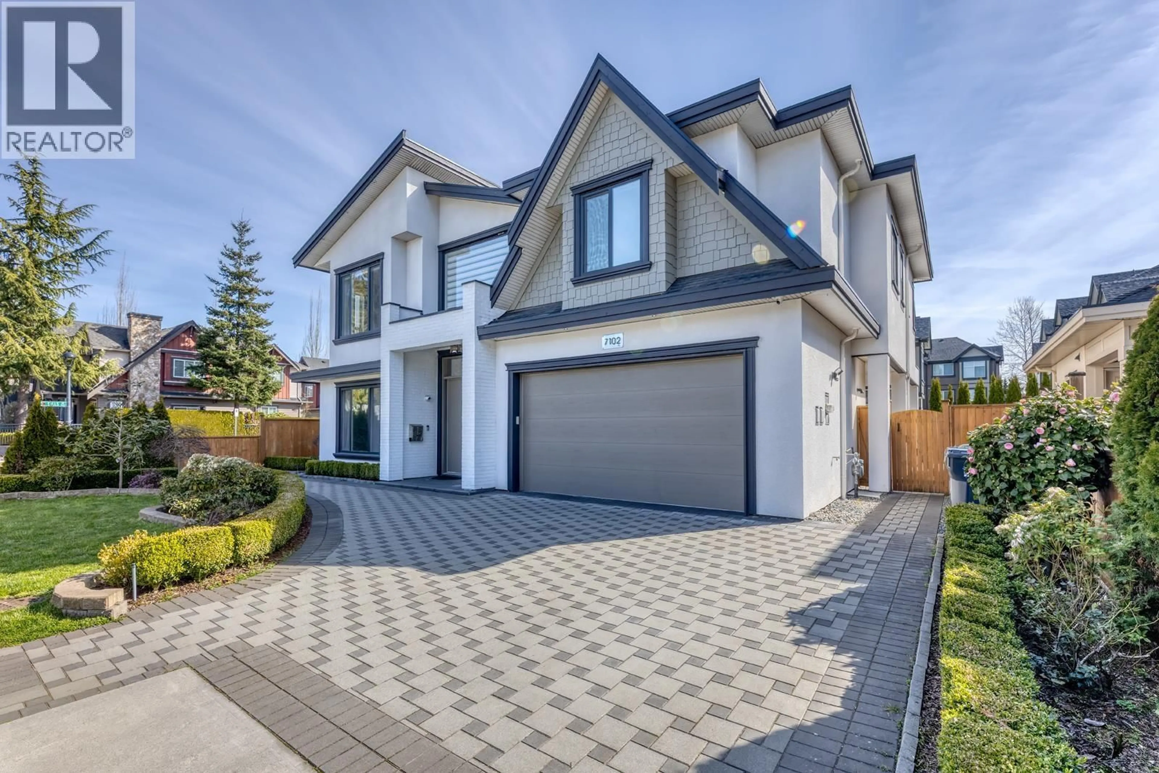 Home with brick exterior material, street for 7102 BRIDGE STREET, Richmond British Columbia V6Y2S7