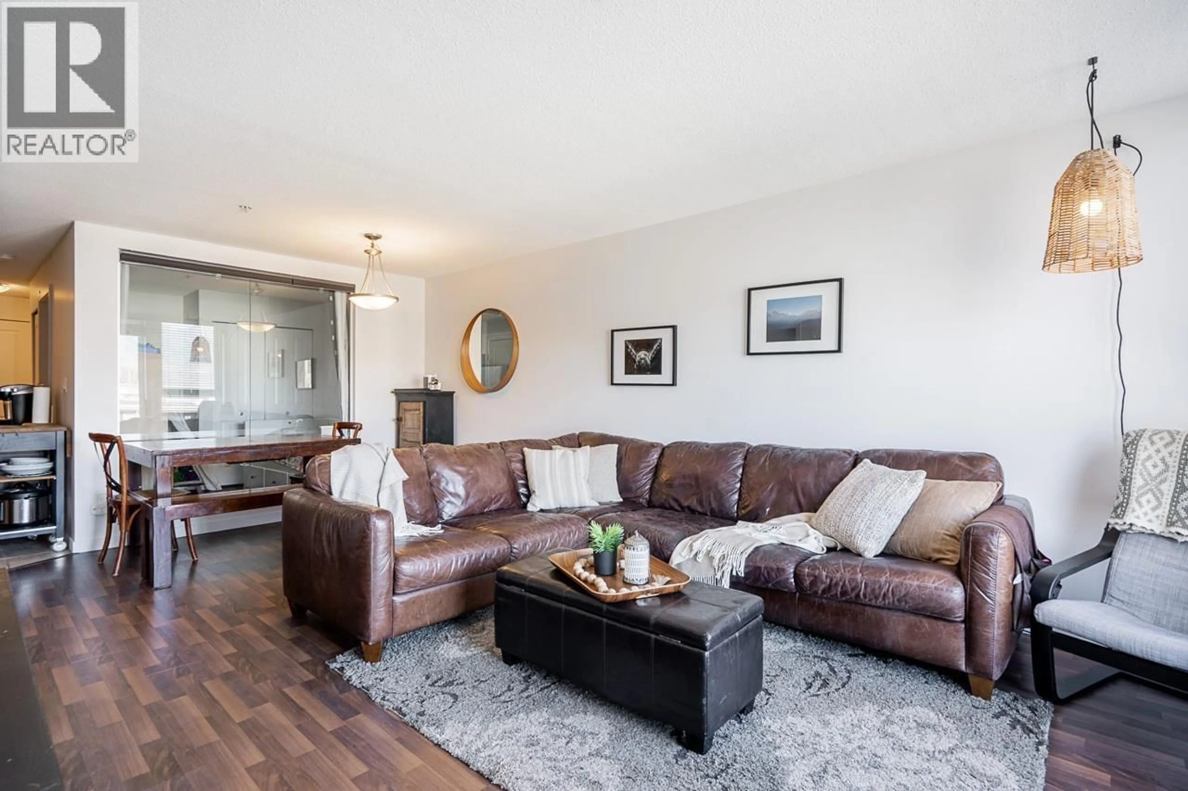 Living room with furniture, wood/laminate floor for 310 - 2636 HASTINGS STREET, Vancouver British Columbia V5K0A4