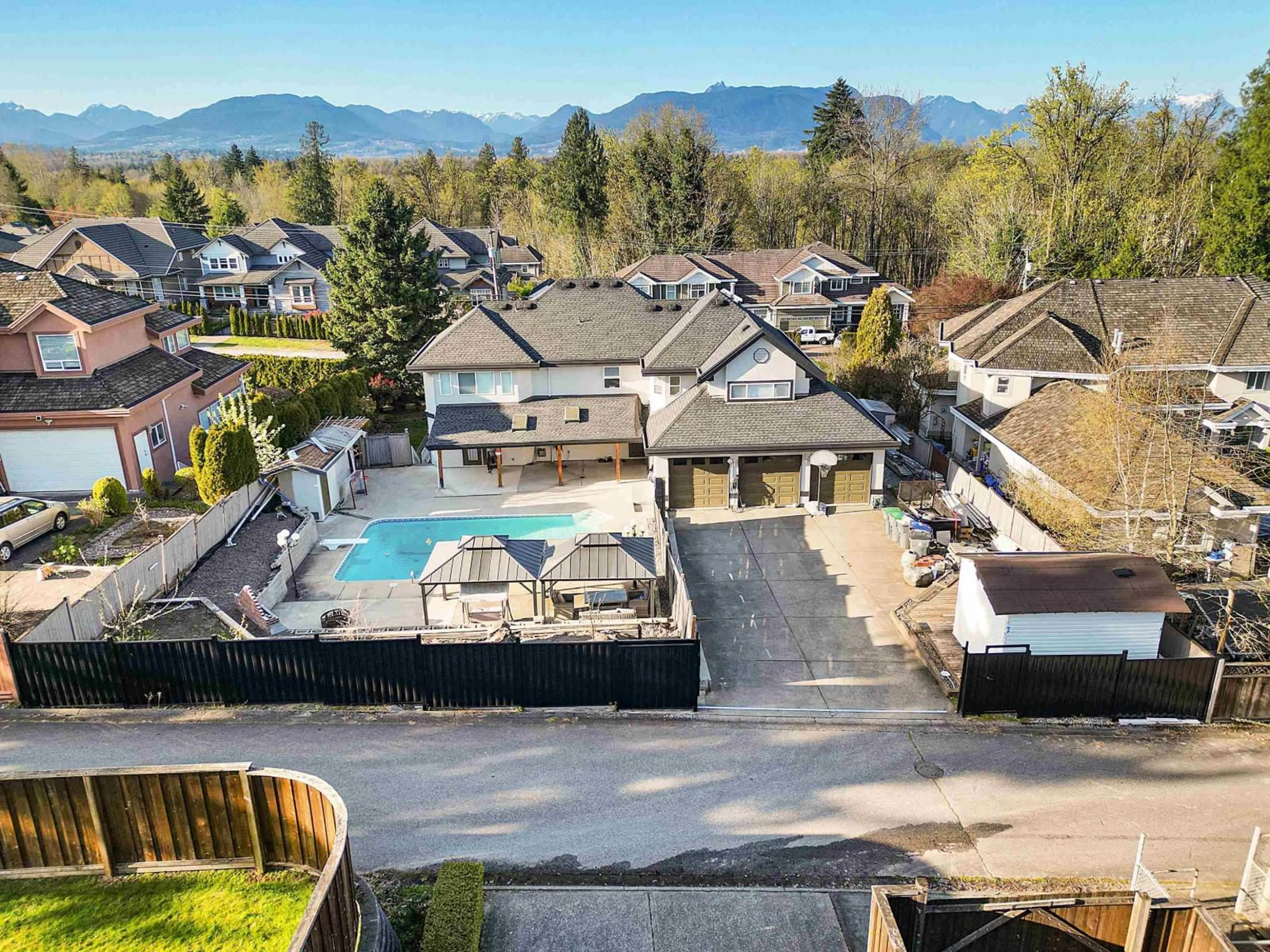 A pic from outside/outdoor area/front of a property/back of a property/a pic from drone, mountain view for 17148 104 AVENUE, Surrey British Columbia V4N4R6