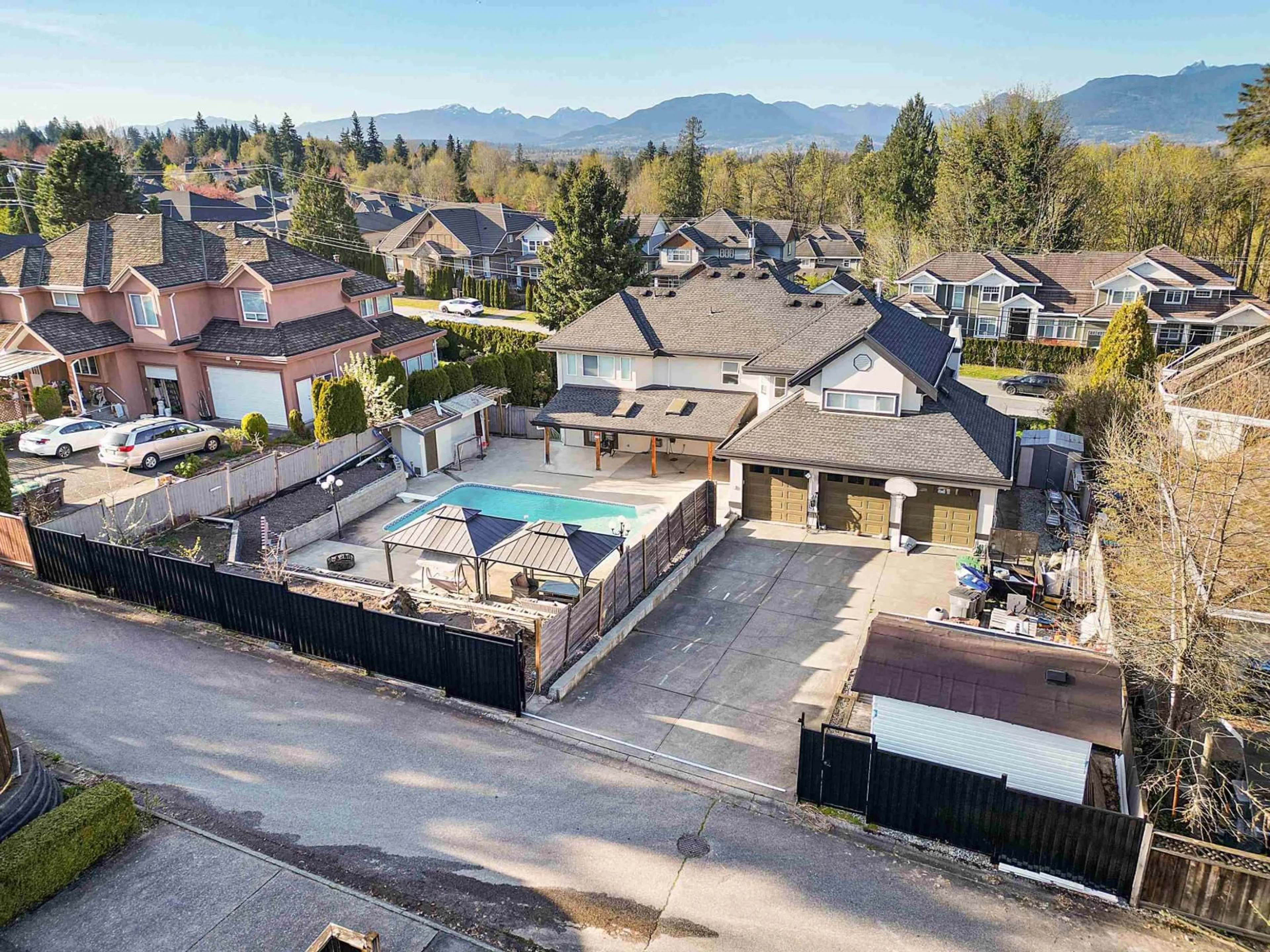 A pic from outside/outdoor area/front of a property/back of a property/a pic from drone, mountain view for 17148 104 AVENUE, Surrey British Columbia V4N4R6