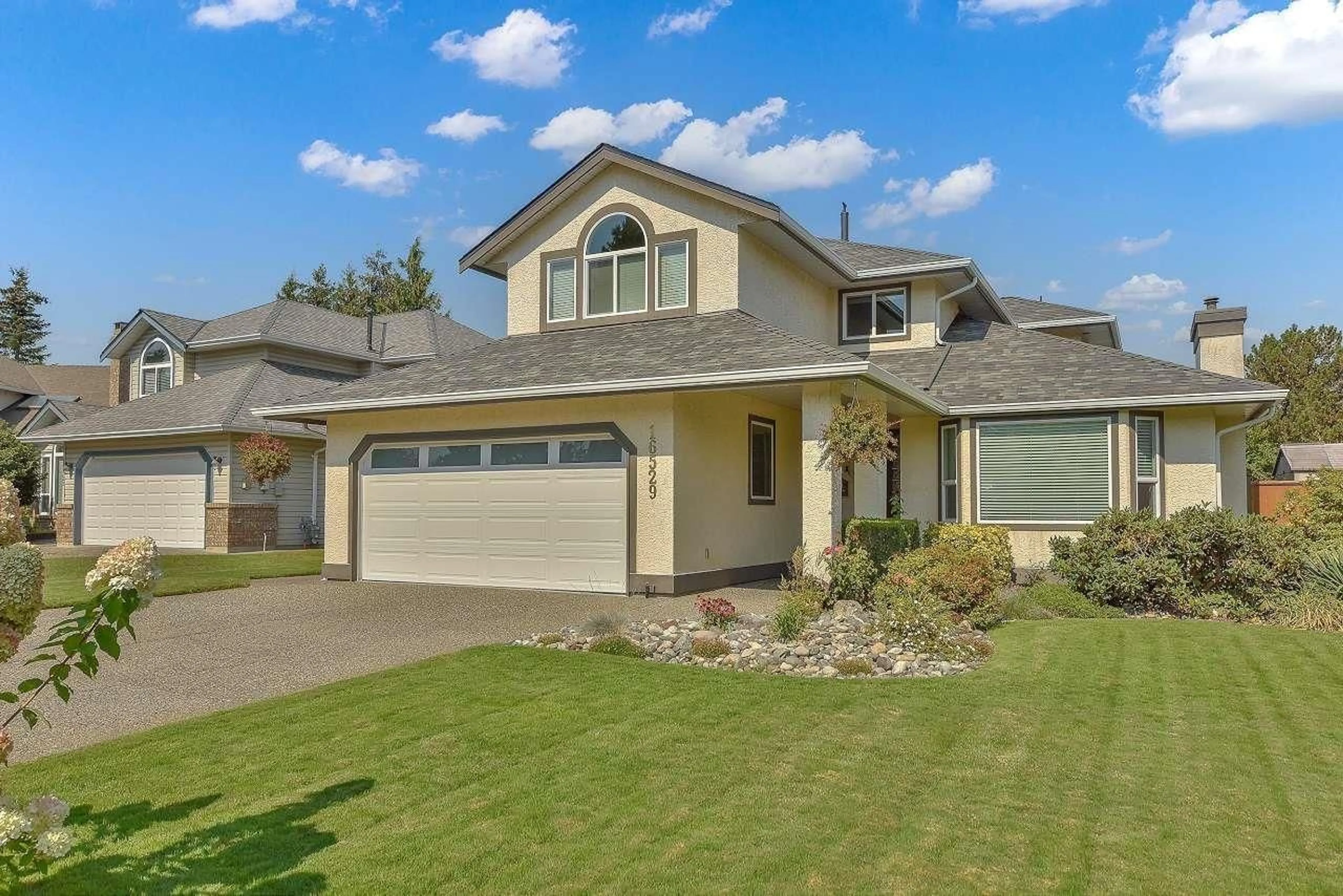 Home with vinyl exterior material, street for 16529 85TH AVENUE, Surrey British Columbia V4N3H2