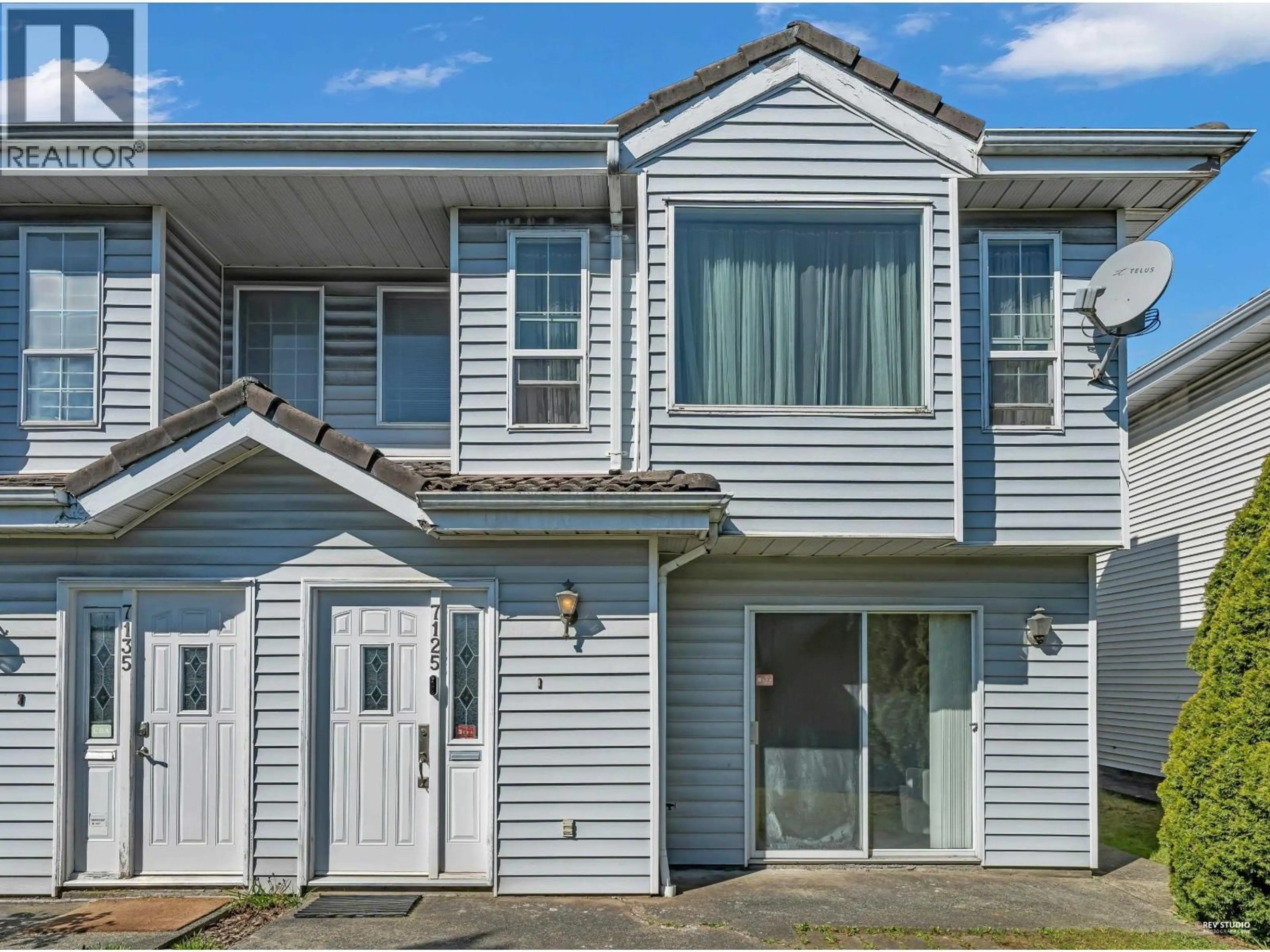 Home with vinyl exterior material, street for 7125 MAIN STREET, Vancouver British Columbia V5X3J1