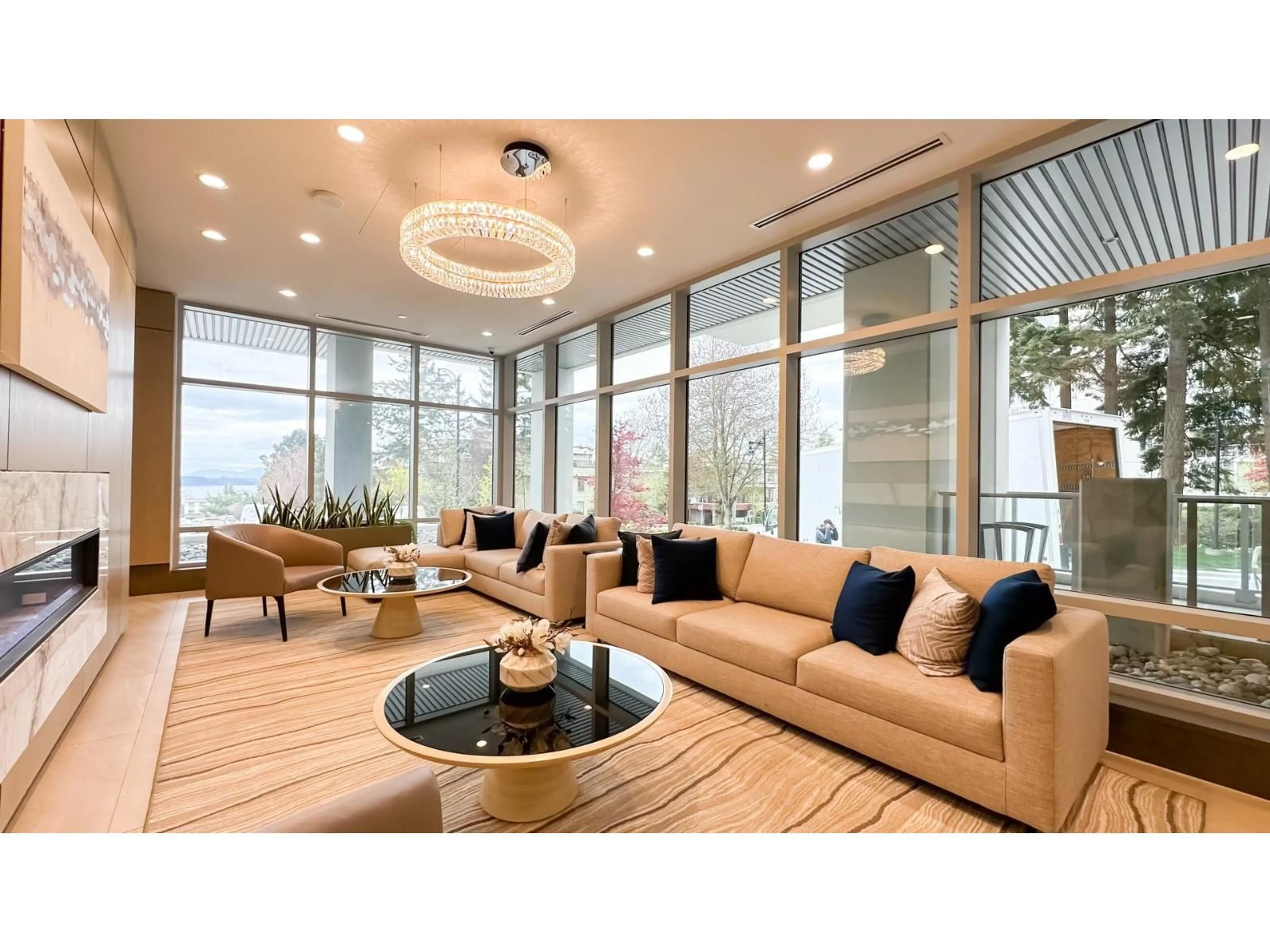 Living room with furniture, wood/laminate floor for 405 - 15165 THRIFT AVENUE, Surrey British Columbia V4B0C1