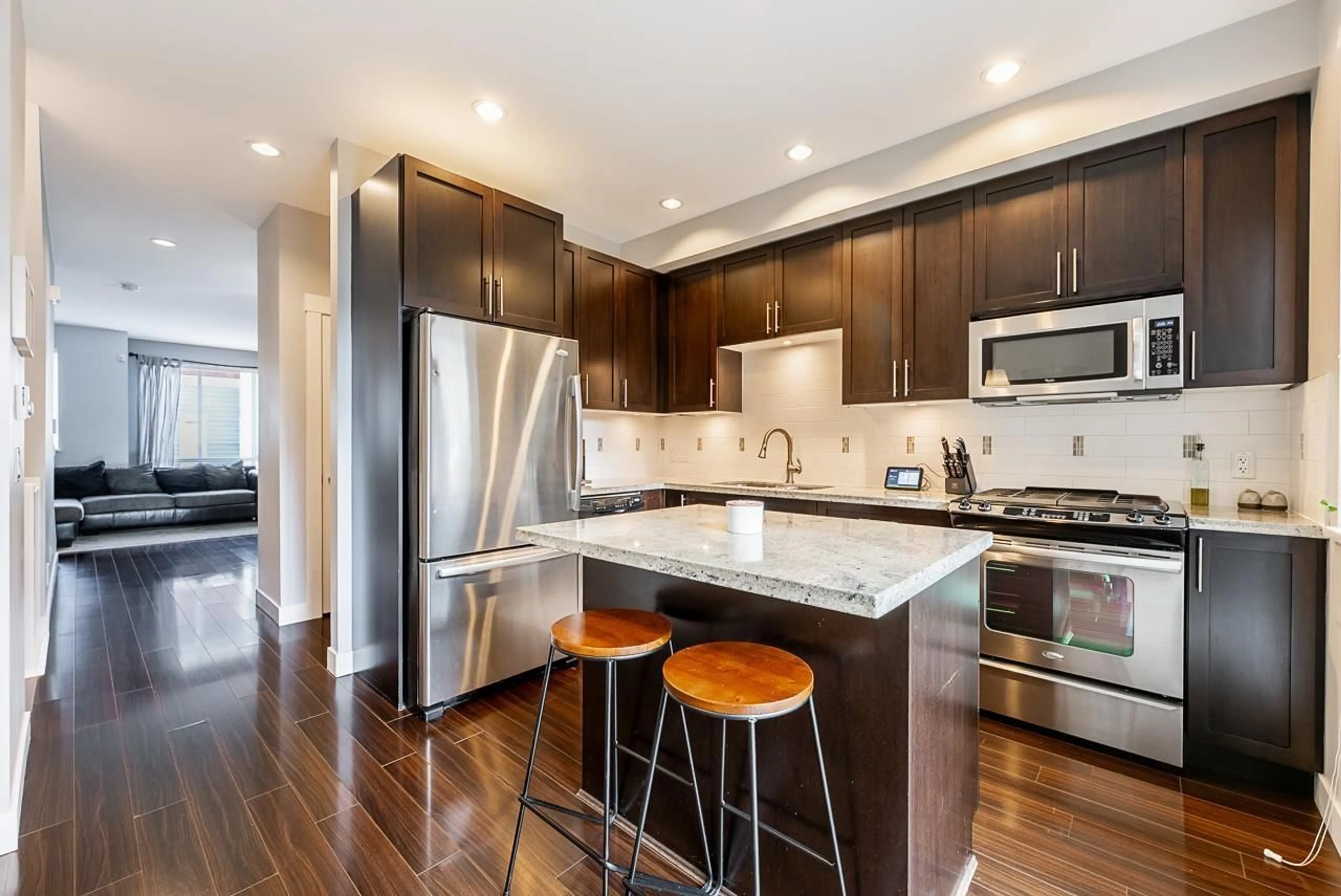 Open concept kitchen, wood/laminate floor for 8 - 2929 156 STREET, Surrey British Columbia V3Z0S9
