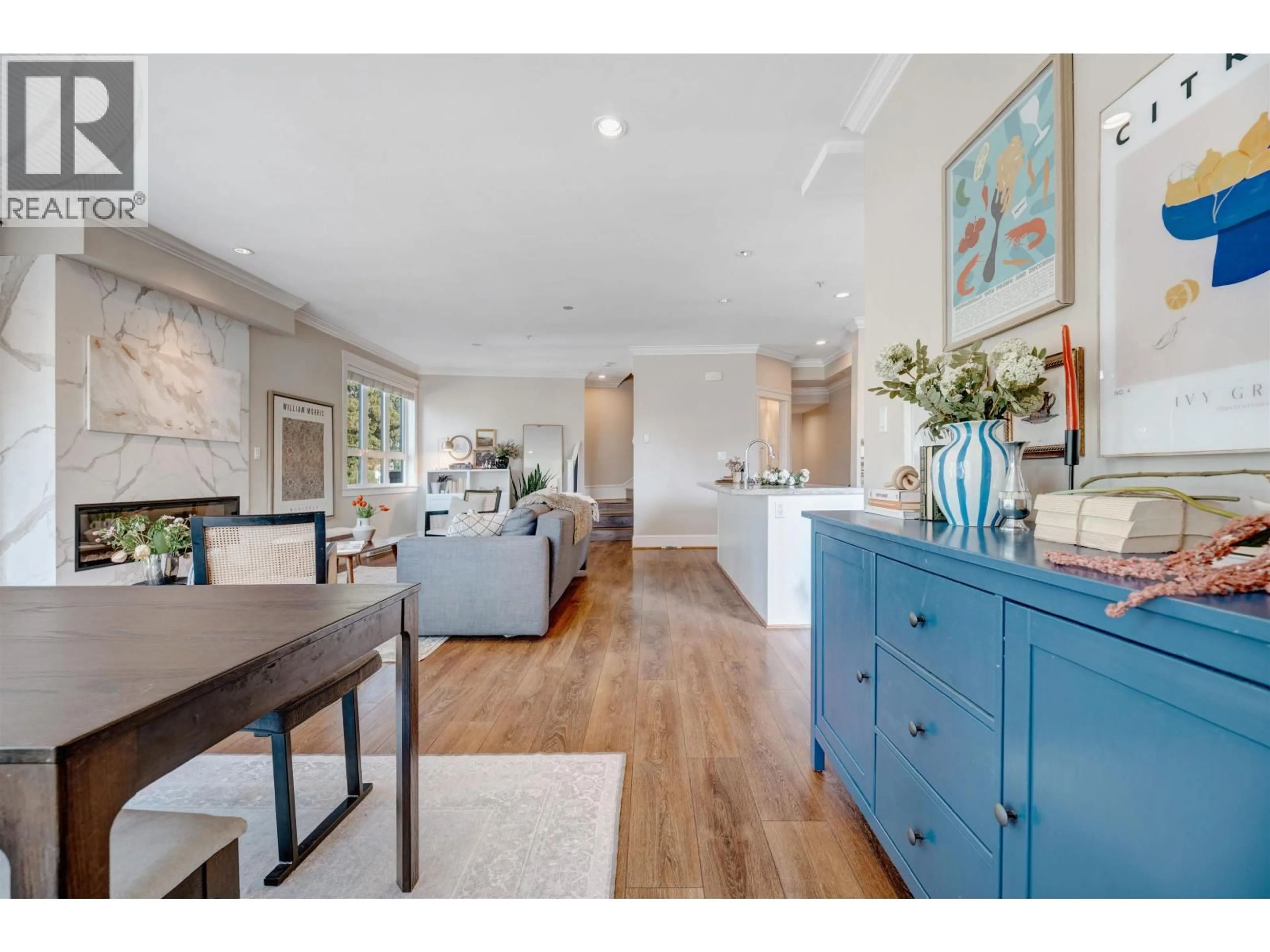 Open concept kitchen, wood/laminate floor for 308 SEYMOUR RIVER PLACE, North Vancouver British Columbia V7H1S7