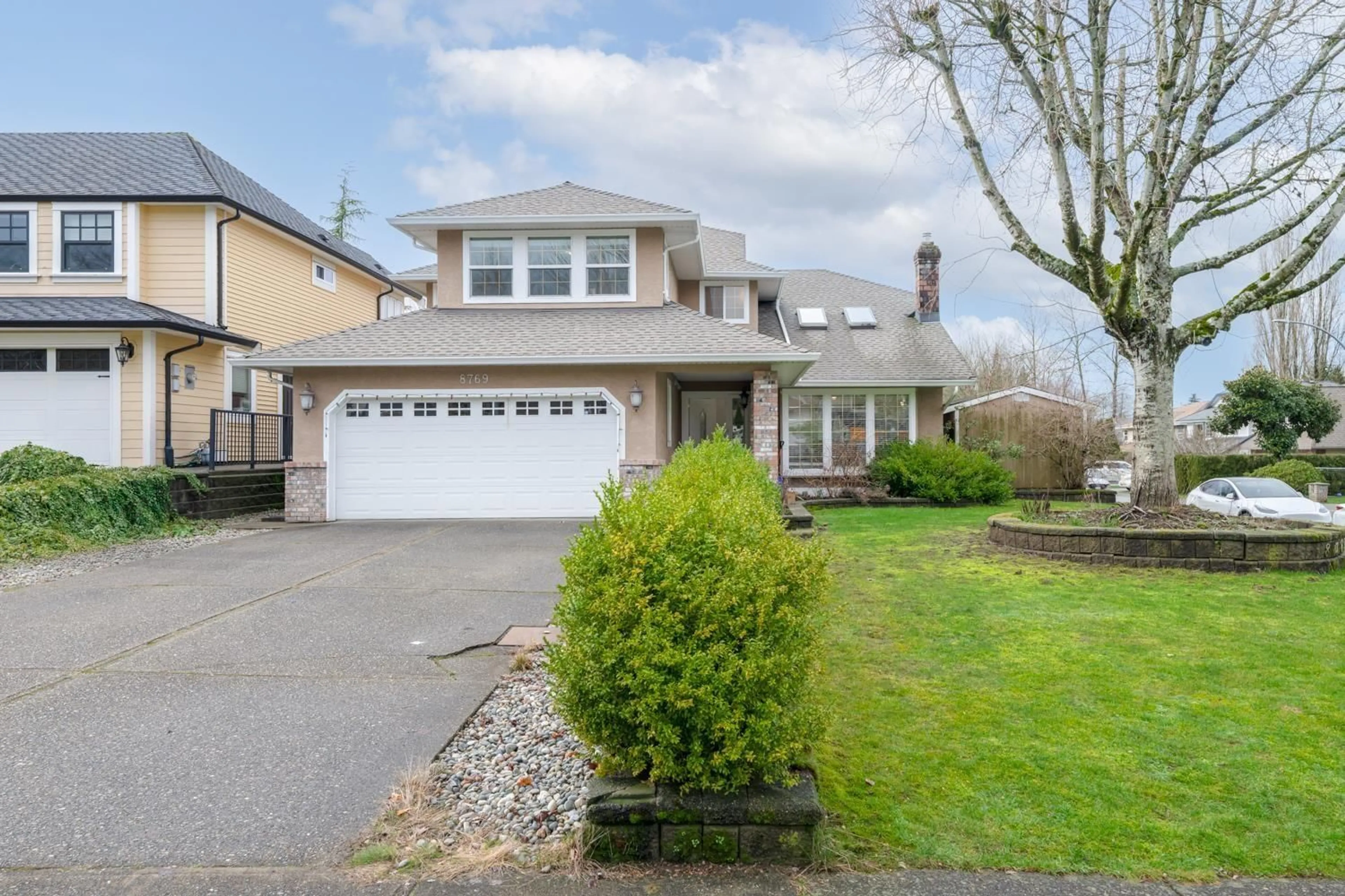 Home with vinyl exterior material, street for 8769 215B STREET, Langley British Columbia V1M2E6