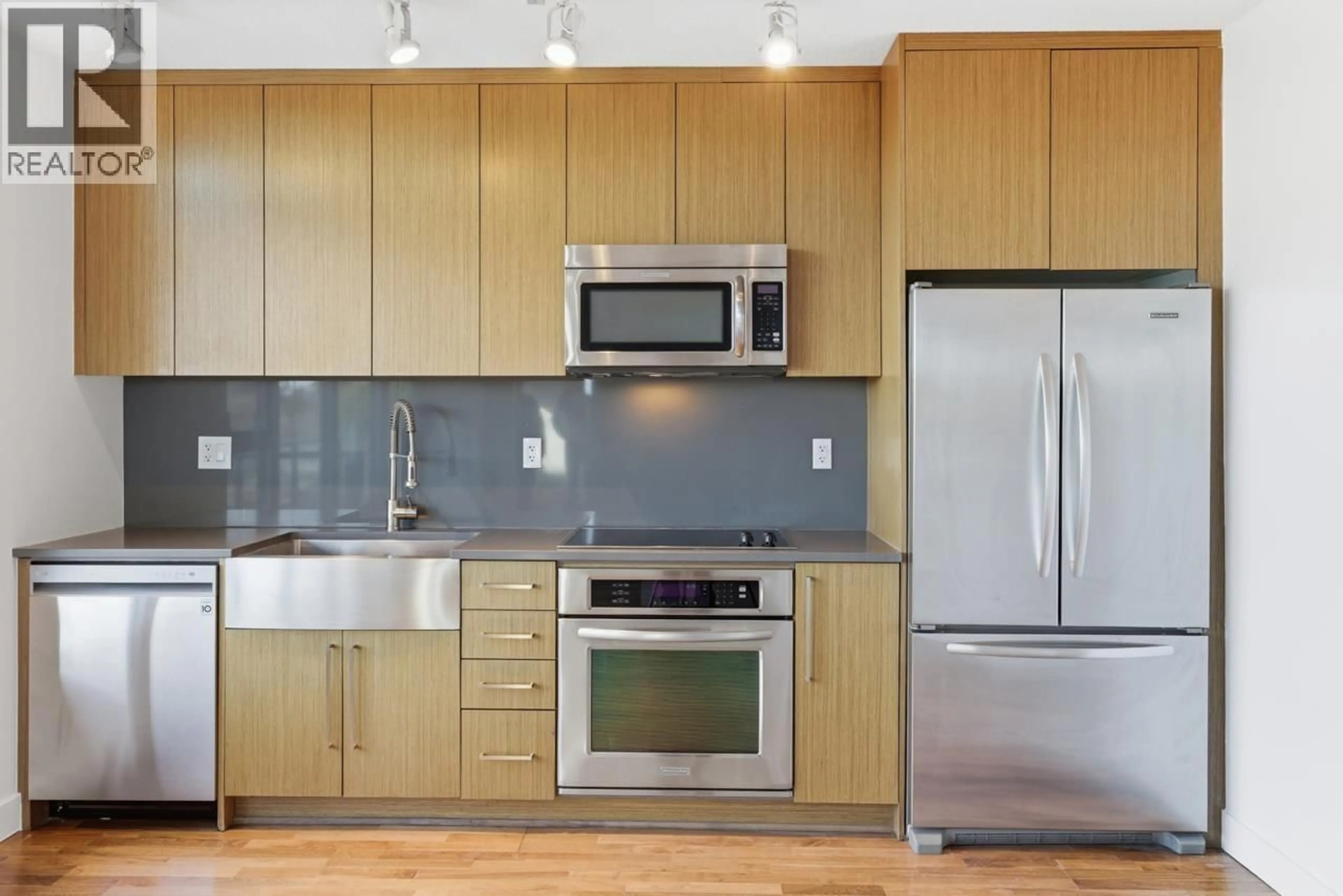 Standard kitchen, wood/laminate floor for 711 - 250 6 AVENUE, Vancouver British Columbia V5T0B7