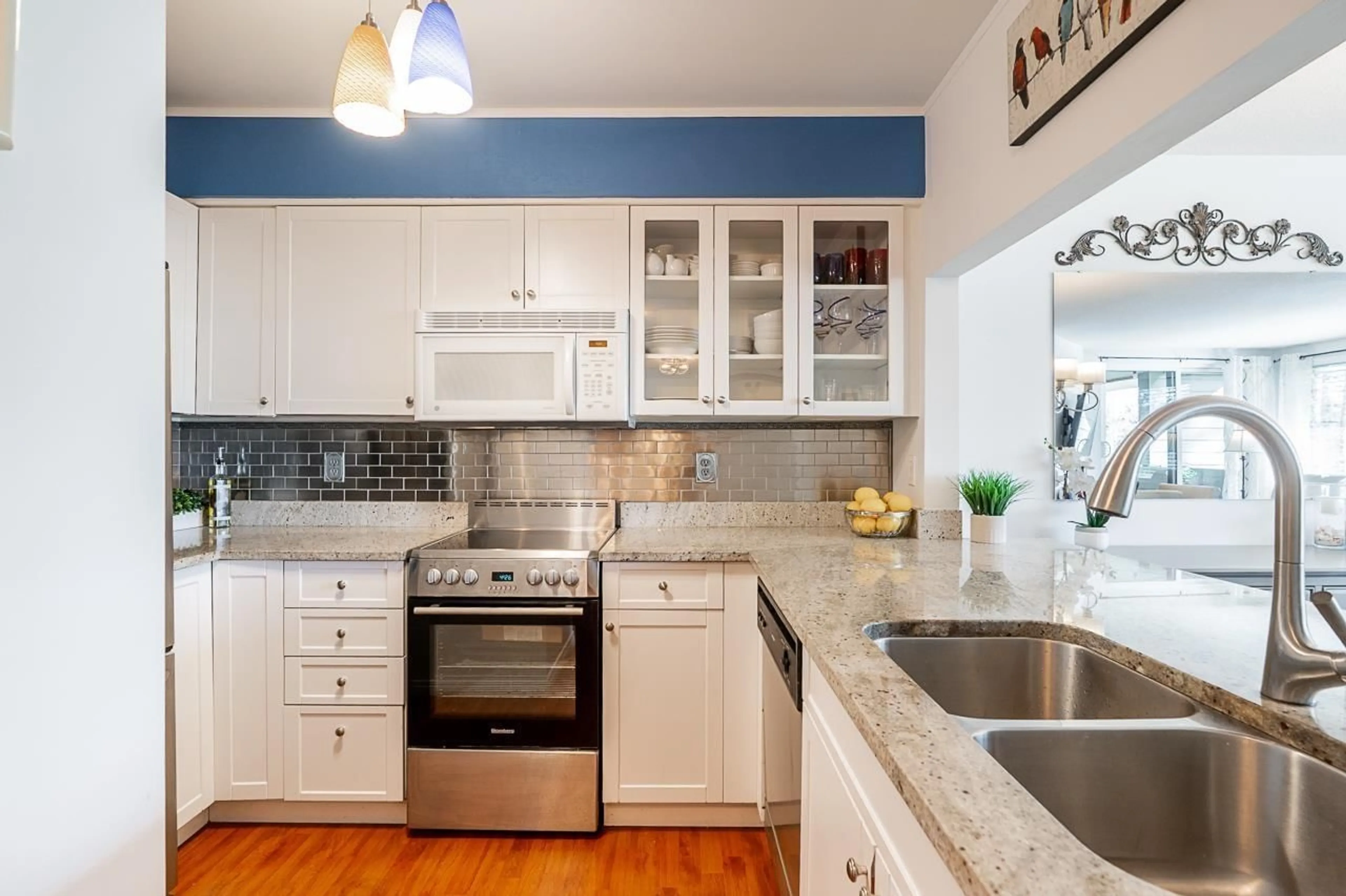 Contemporary kitchen, ceramic/tile floor for 210 - 15272 19 AVENUE, Surrey British Columbia V4A1X6