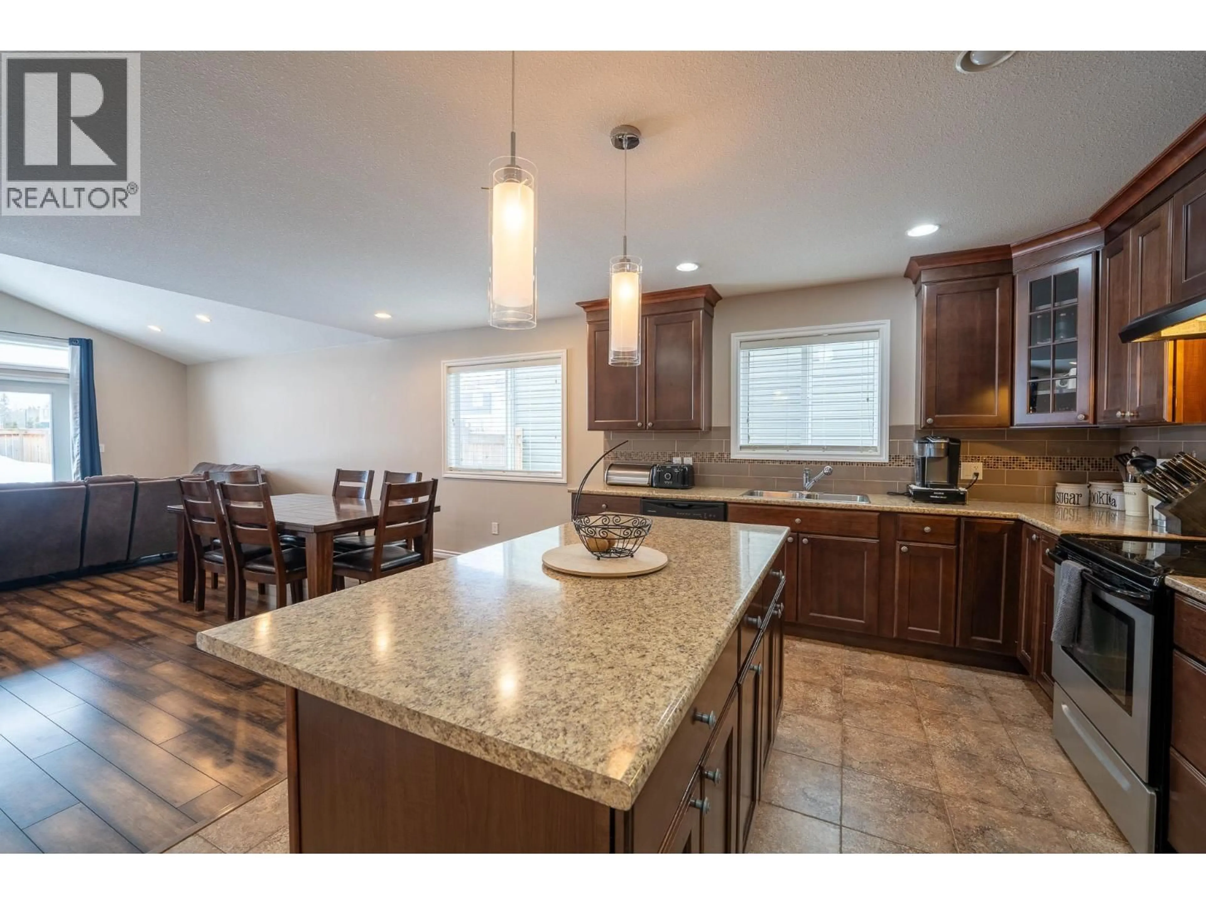 Open concept kitchen, ceramic/tile floor for 10009 117 AVENUE, Fort St. John British Columbia V1J0K3