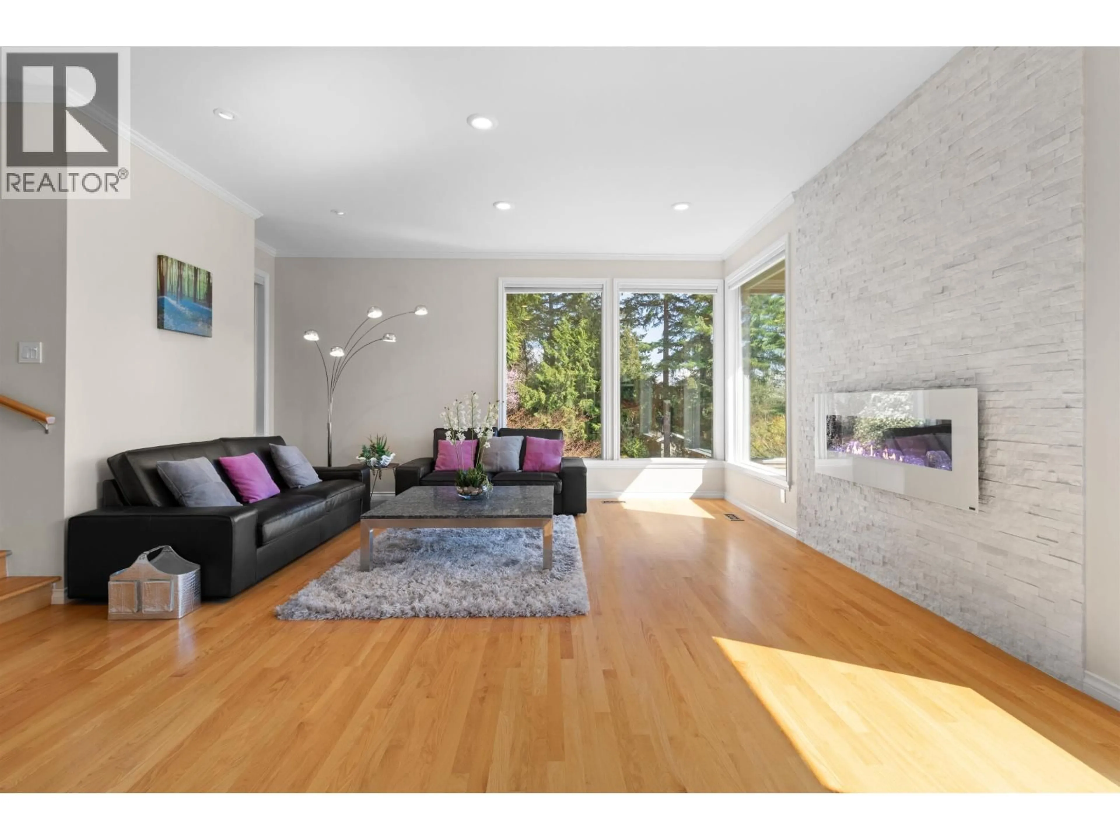 Living room with furniture, wood/laminate floor for 4635 CAULFEILD DRIVE, West Vancouver British Columbia V7W1E9