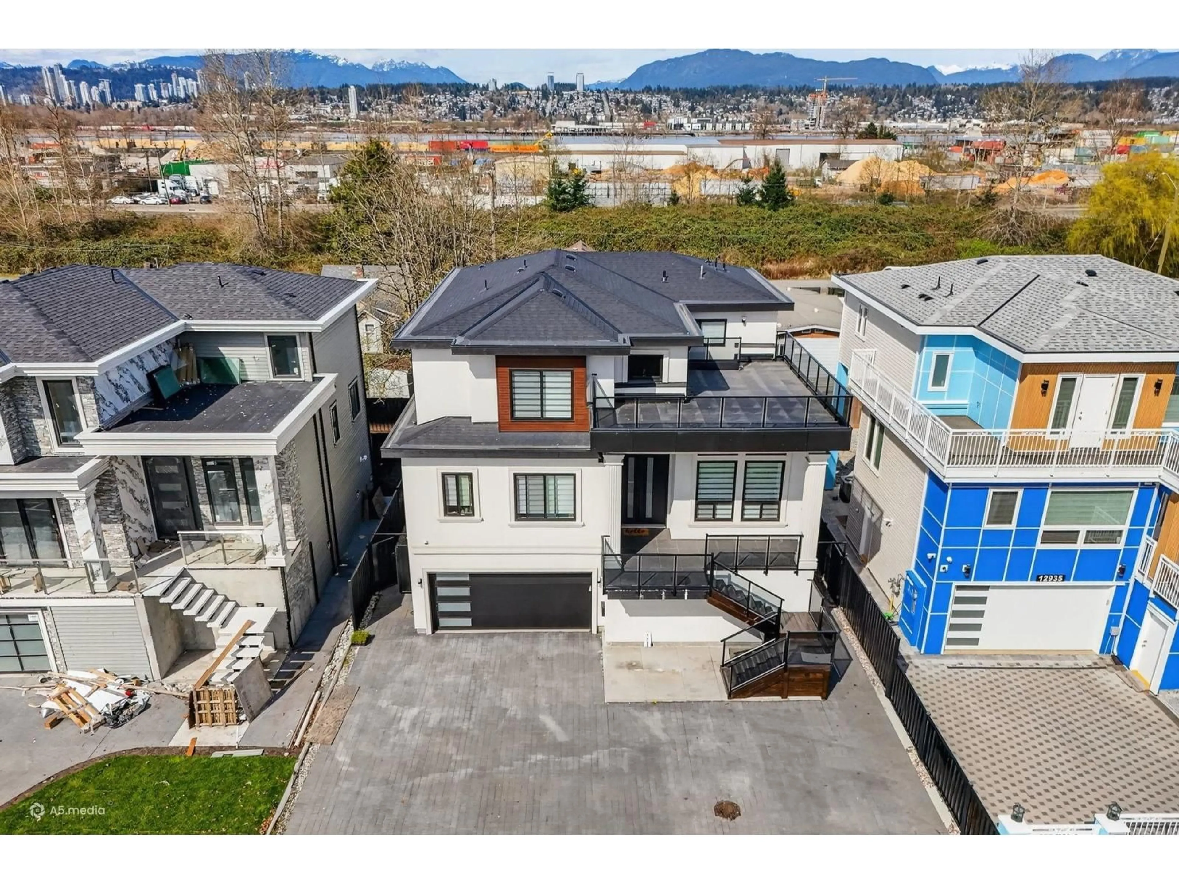 A pic from outside/outdoor area/front of a property/back of a property/a pic from drone, unknown for 12927 115A AVENUE, Surrey British Columbia V3R2R3