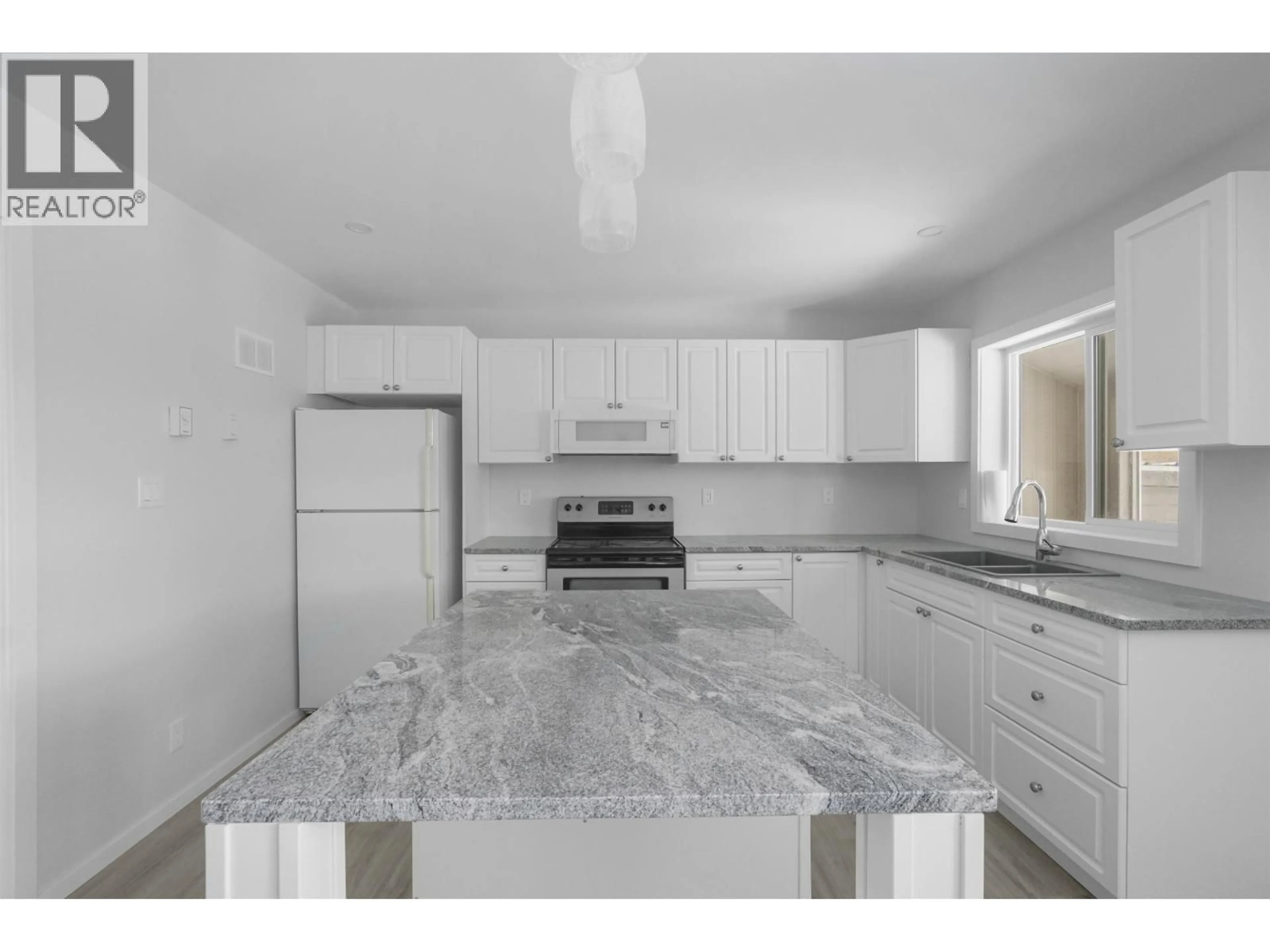 Open concept kitchen, ceramic/tile floor for 15 GANNET CRESCENT, Kitimat British Columbia V8C1P4