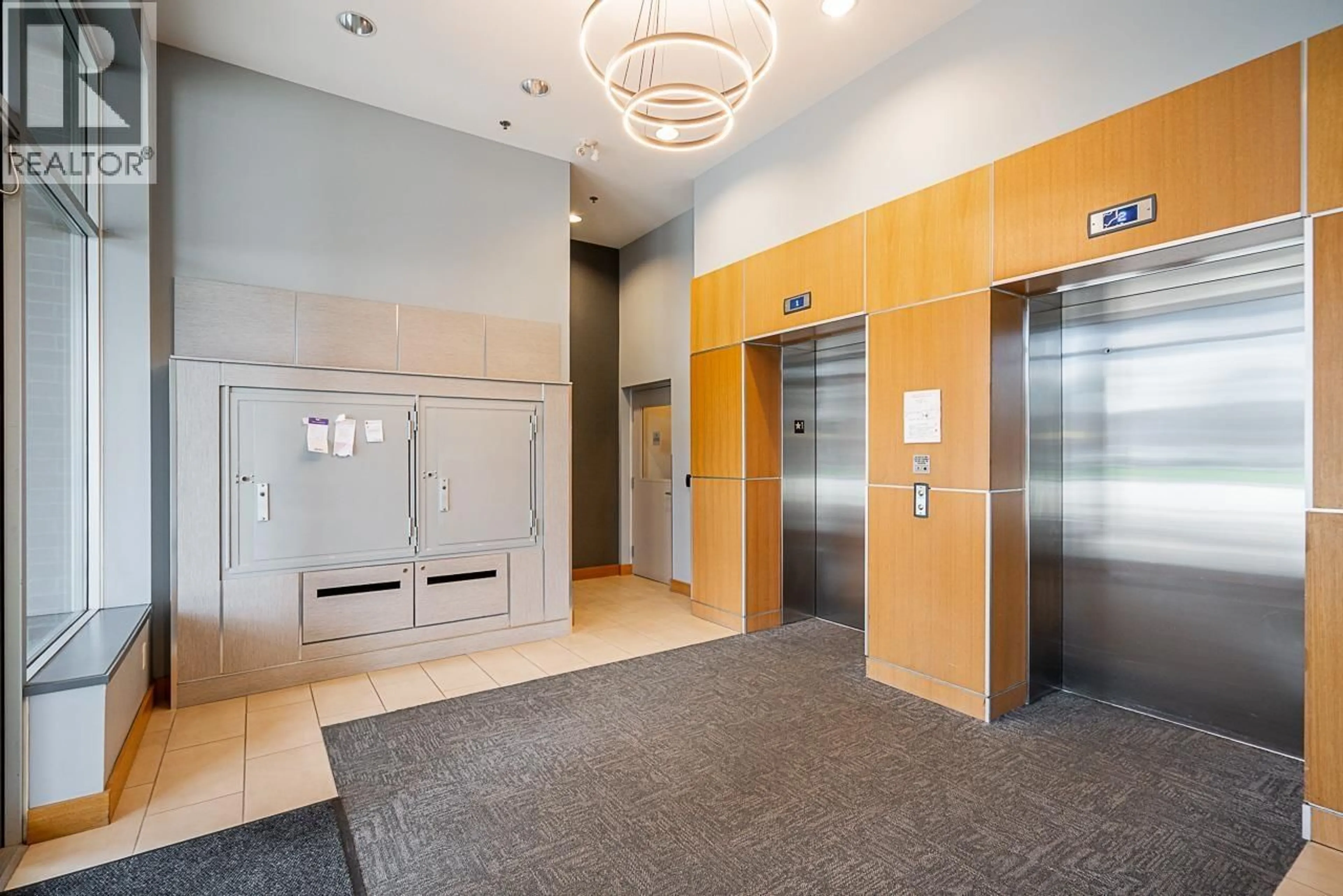 Indoor foyer for 208 - 1330 MARINE DRIVE, North Vancouver British Columbia V7P1T4