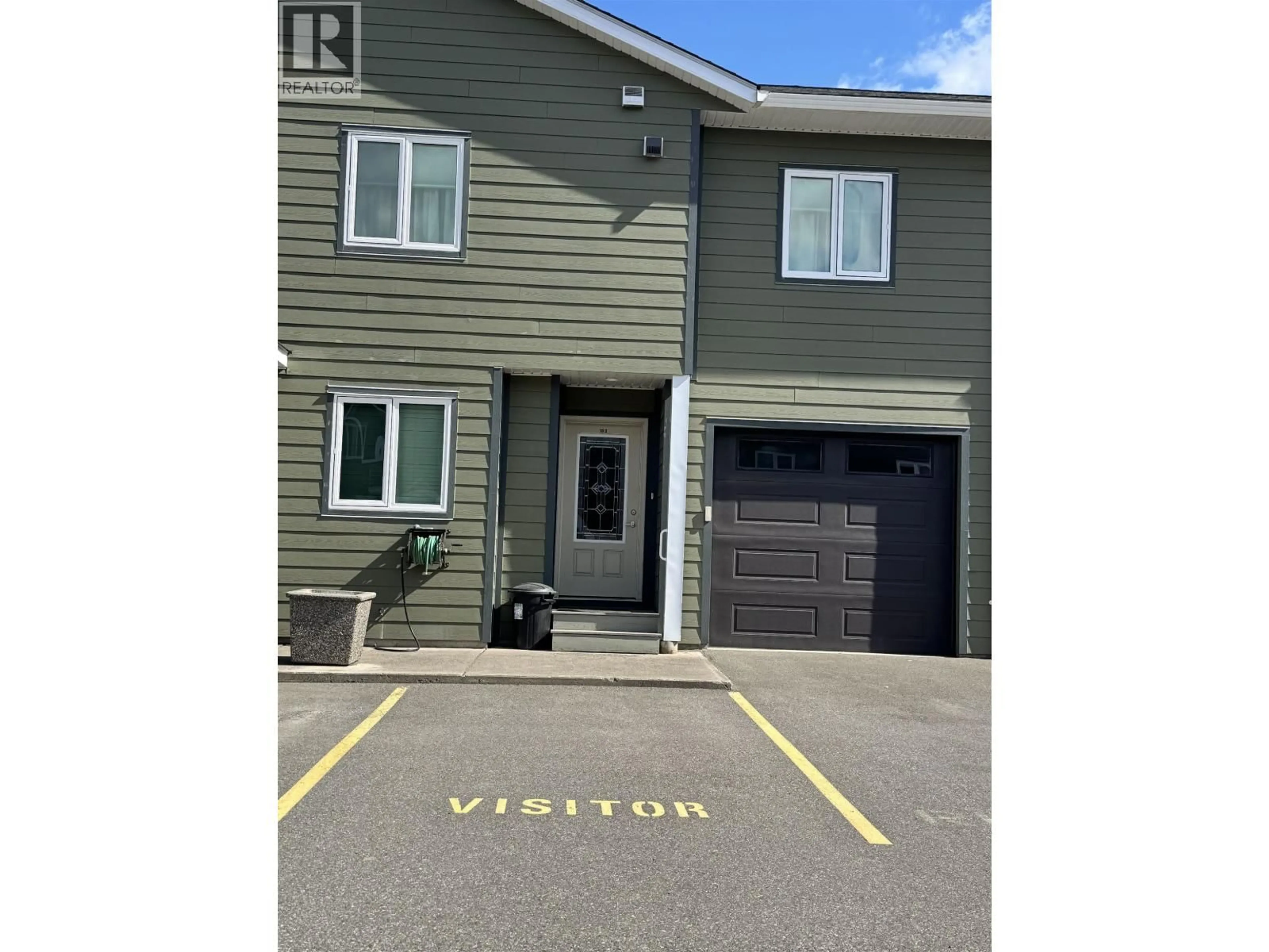 A pic from outside/outdoor area/front of a property/back of a property/a pic from drone, street for 103 - 4719 DAVIS AVENUE, Terrace British Columbia V8G1Y1