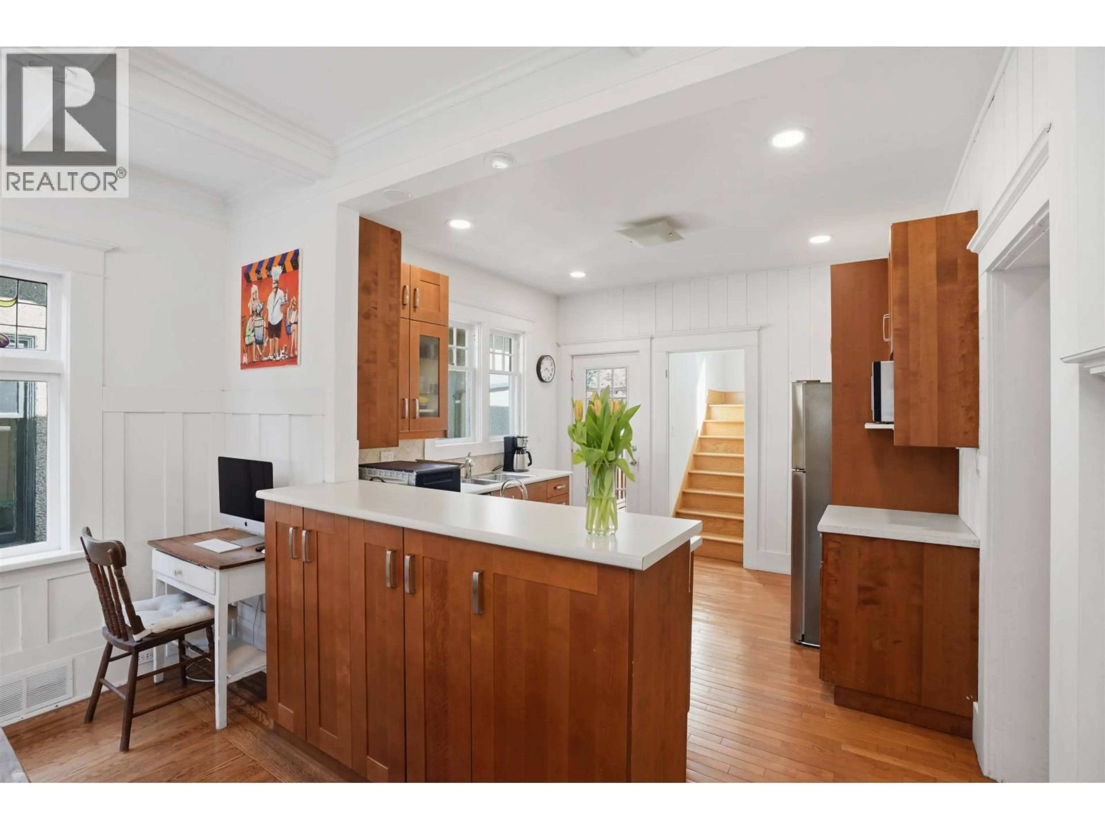 Open concept kitchen, ceramic/tile floor for 3350 3RD AVENUE, Vancouver British Columbia V6R1L4