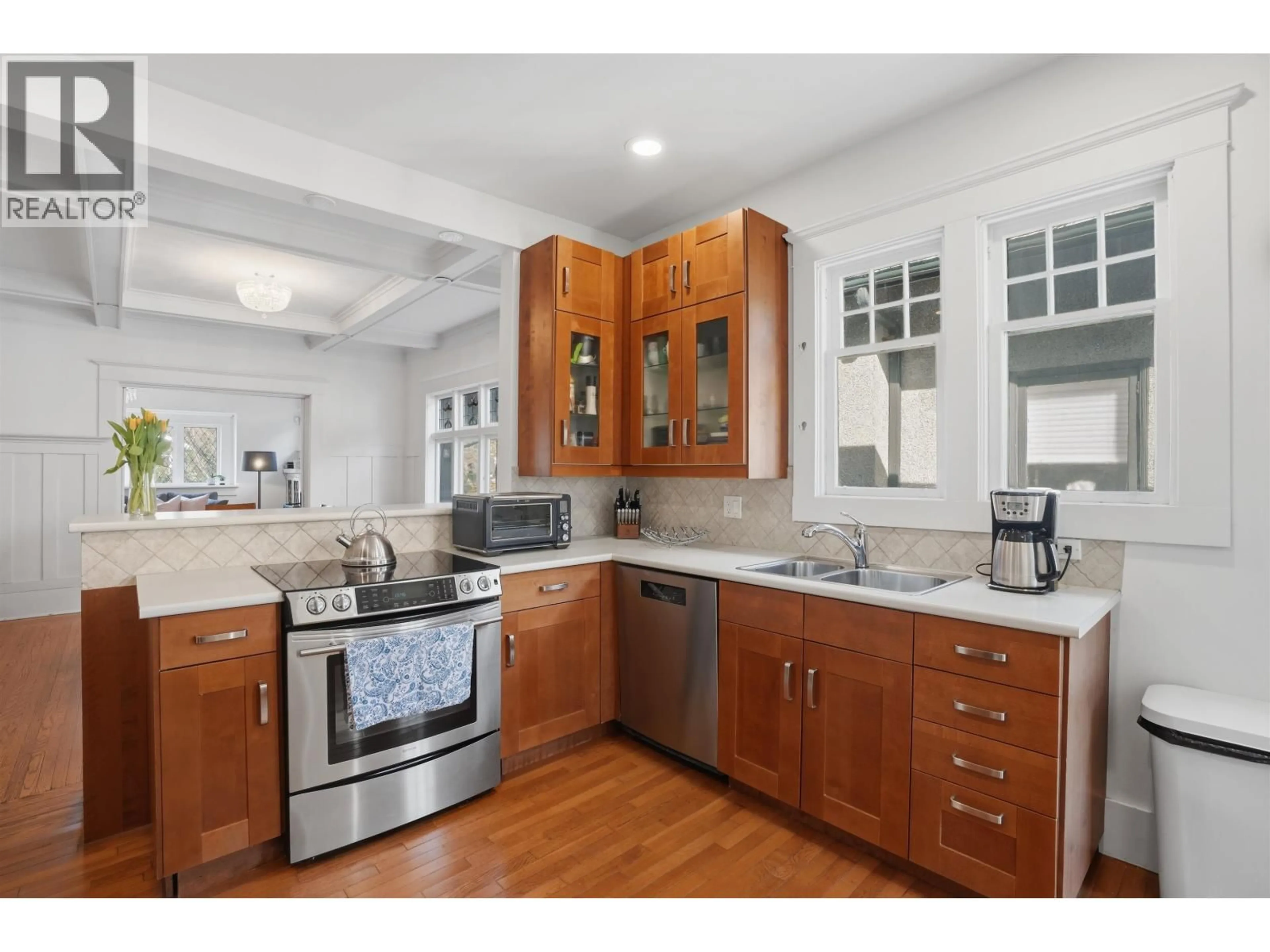 Open concept kitchen, ceramic/tile floor for 3350 3RD AVENUE, Vancouver British Columbia V6R1L4