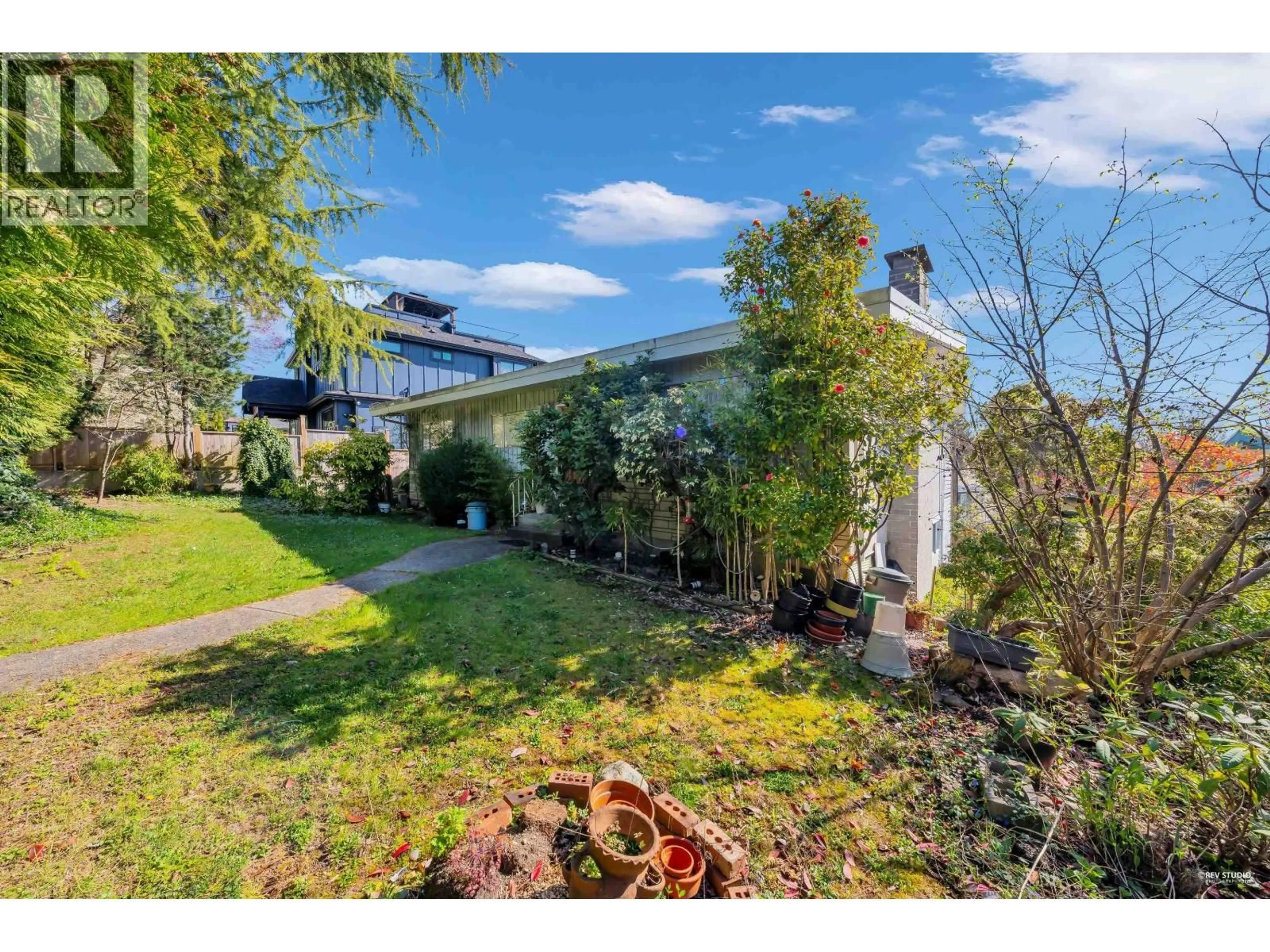 A pic from outside/outdoor area/front of a property/back of a property/a pic from drone, street for 7790 ELLIOTT STREET, Vancouver British Columbia V5S2N9