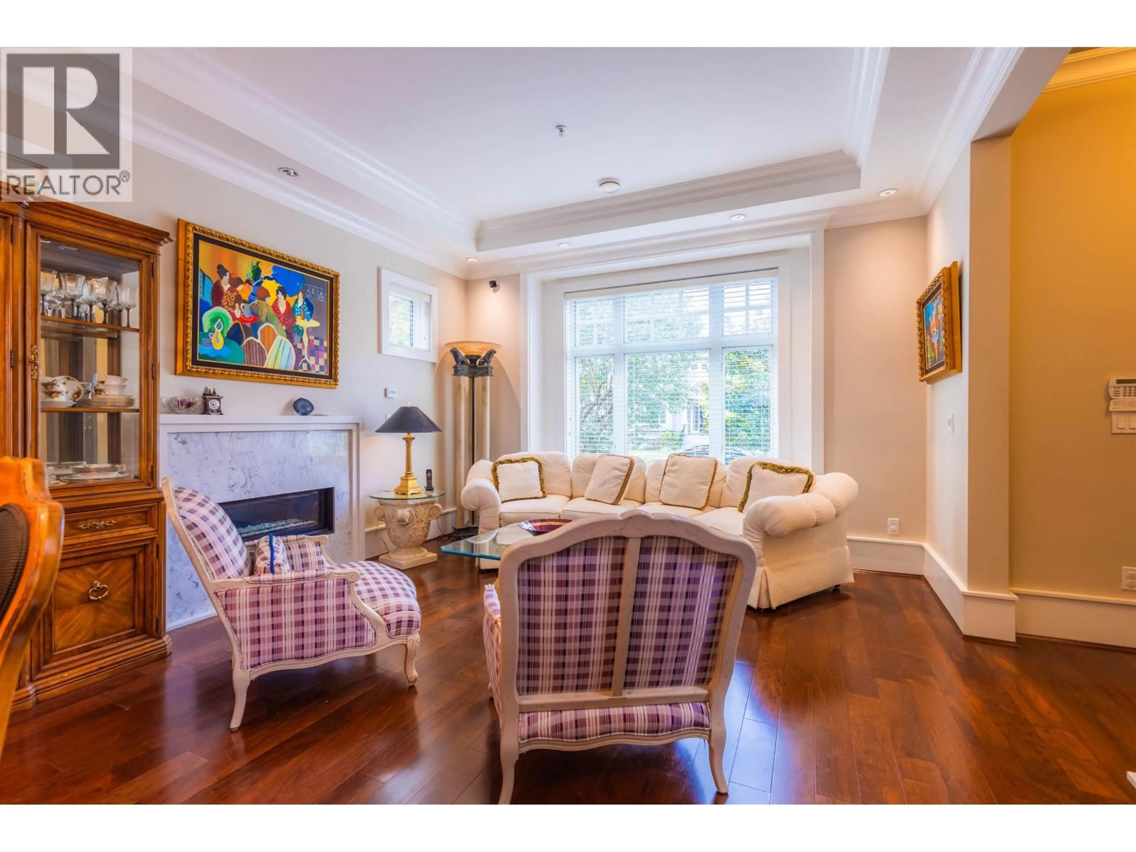 Living room with furniture, wood/laminate floor for 8150 FRENCH STREET, Vancouver British Columbia V6P4W1