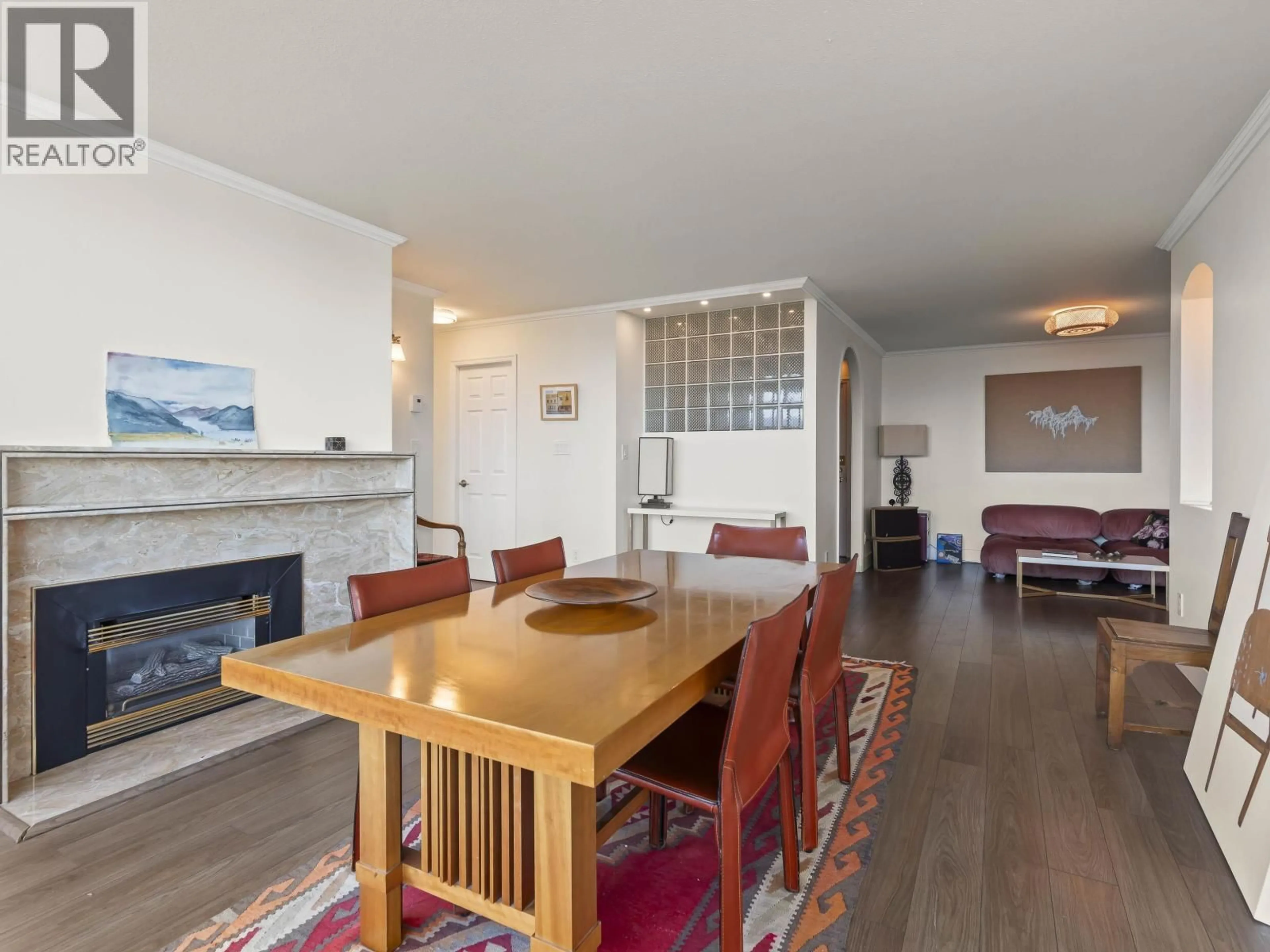 Living room with furniture, wood/laminate floor for 1102 - 5425 YEW STREET, Vancouver British Columbia V6M3X7